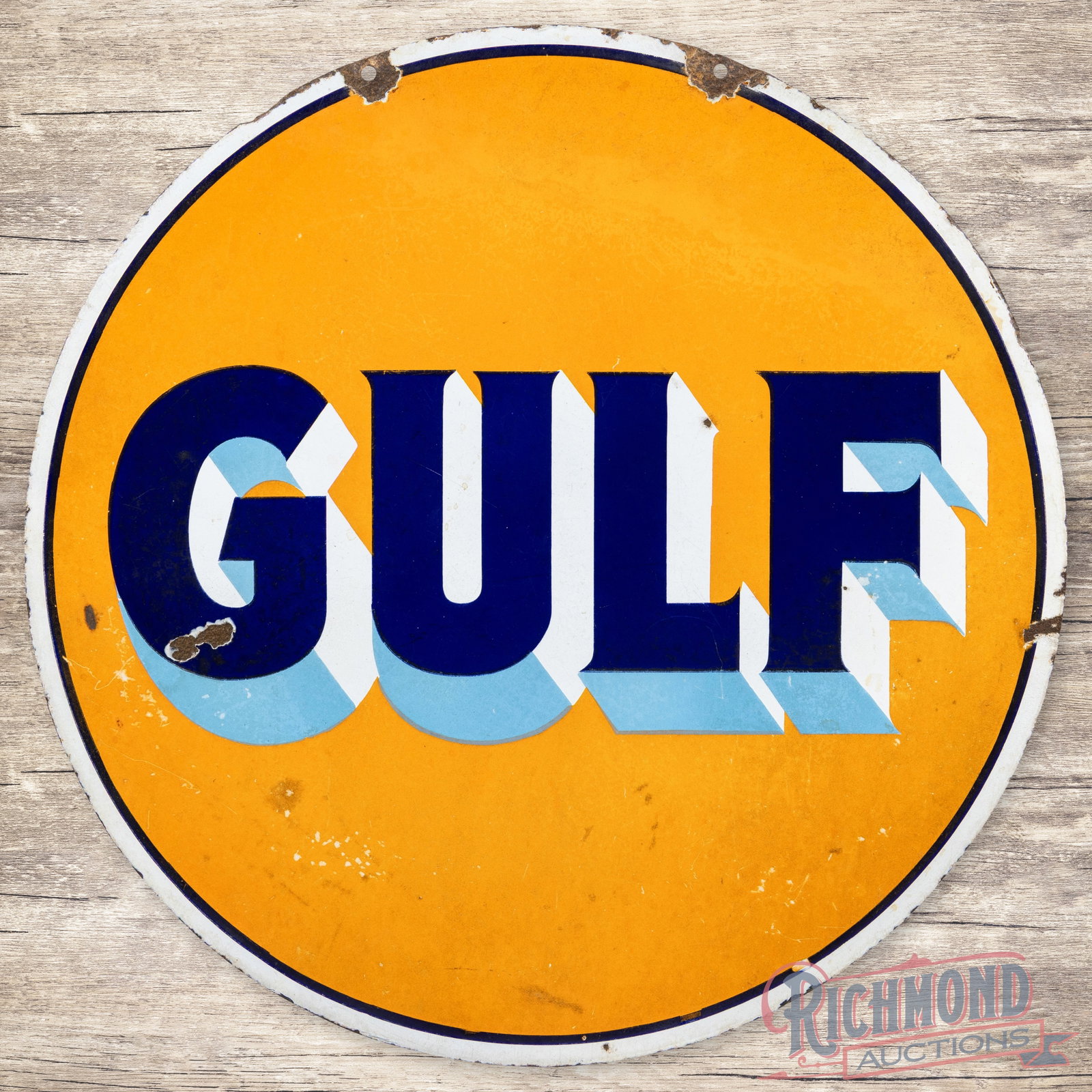 Gulf Gasoline Motor Oils 30" Double Sided Porcelain Sign: DSP (double sided porcelain) sign has good color and moderate gloss. The display has wear with chips and areas of discoloration. The perimeter has chips with areas of metal loss along the outer edges.