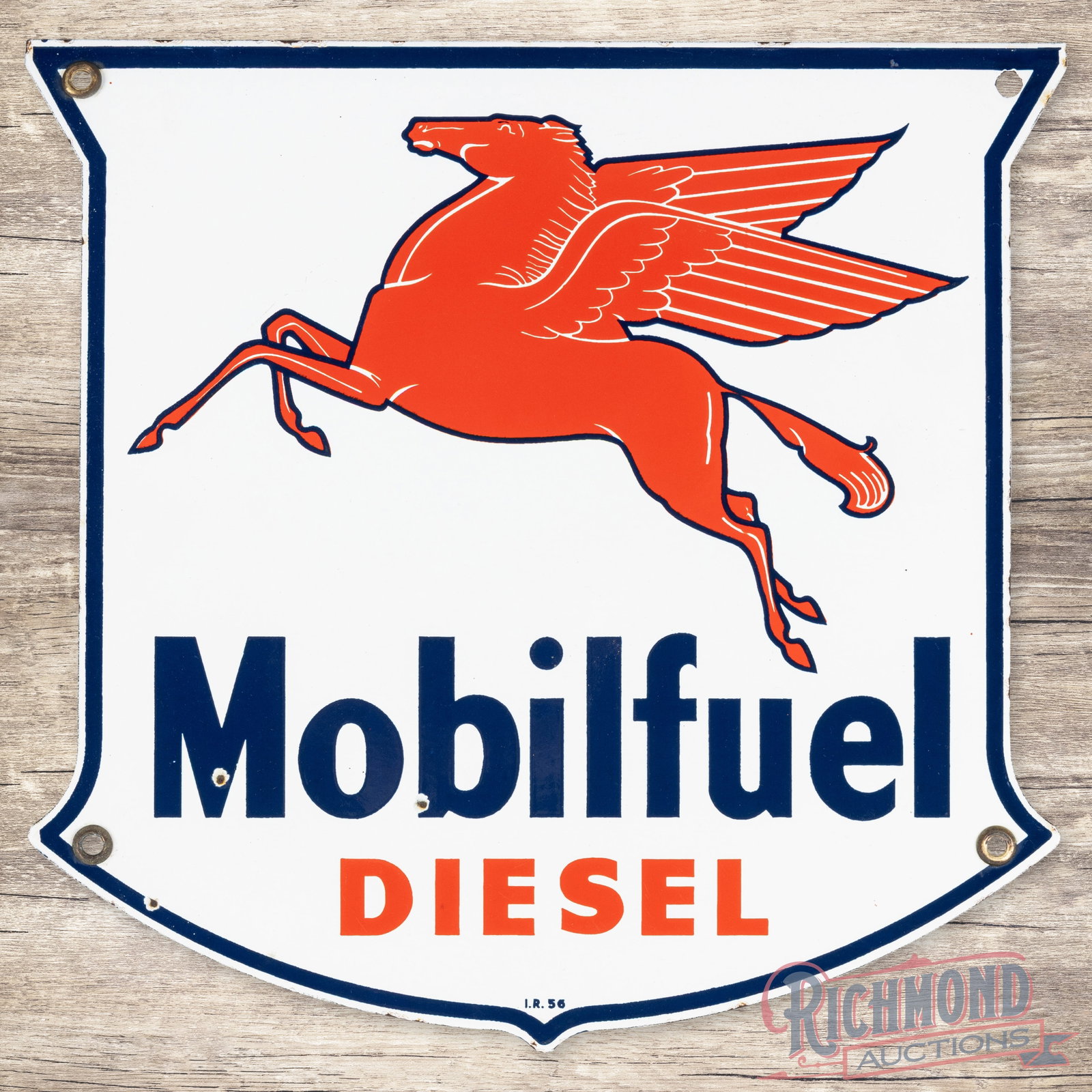 1956 Mobilfuel Diesel Single Sided Porcelain Pump Plate Sign w/ Pegasus: SSP (single sided porcelain) die cut pump plate has excellent color and gloss. The field is clean with two small chips in the lower lettering. The perimeter has small chips which are primarily along t