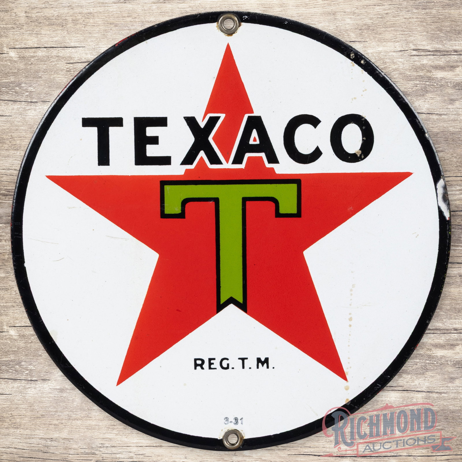 1931 Texaco Motor Oils Gasoline 8" Single Sided Porcelain Sign "Black T": SSP (single sided porcelain) sign has very good color and gloss. The display has light wear with a tiny chip in the "O", fine scratches and tiny discolored spots in the right fields. The perimeter has