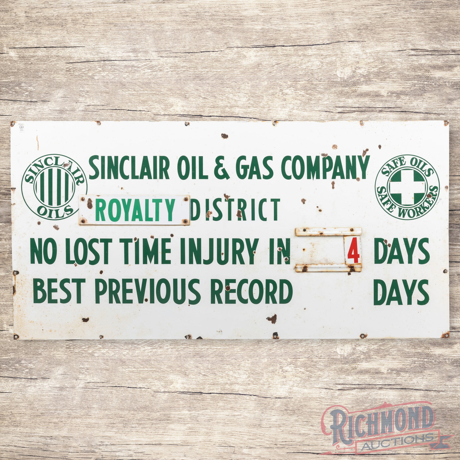 Sinclair Oil & Gas Company Safety "No Lost Time" 5' Single Sided Porcelain Sign w/ Logo: SSP (single sided porcelain) multipiece sign has good color and gloss. The sign features a "Royalty" attachment with a #4 SSP insert. The field has chips with areas of surface wear and discoloration. 