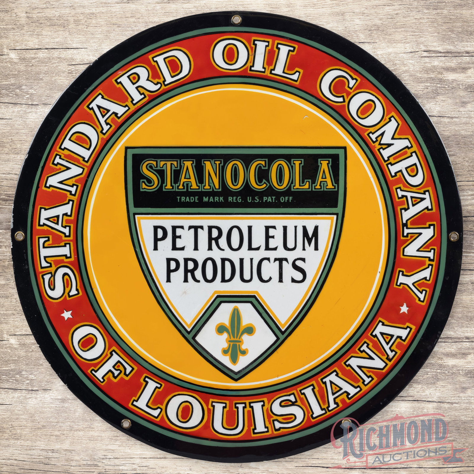 Stanocola Standard Oil Company of Louisiana 18" Single Sided Porcelain Logo Sign: SSP (single sided porcelain) sign has been restored. The display has light wear with a small bruise in the logo and minor surface imperfections. The perimeter has tiny paint chips along the outer edge