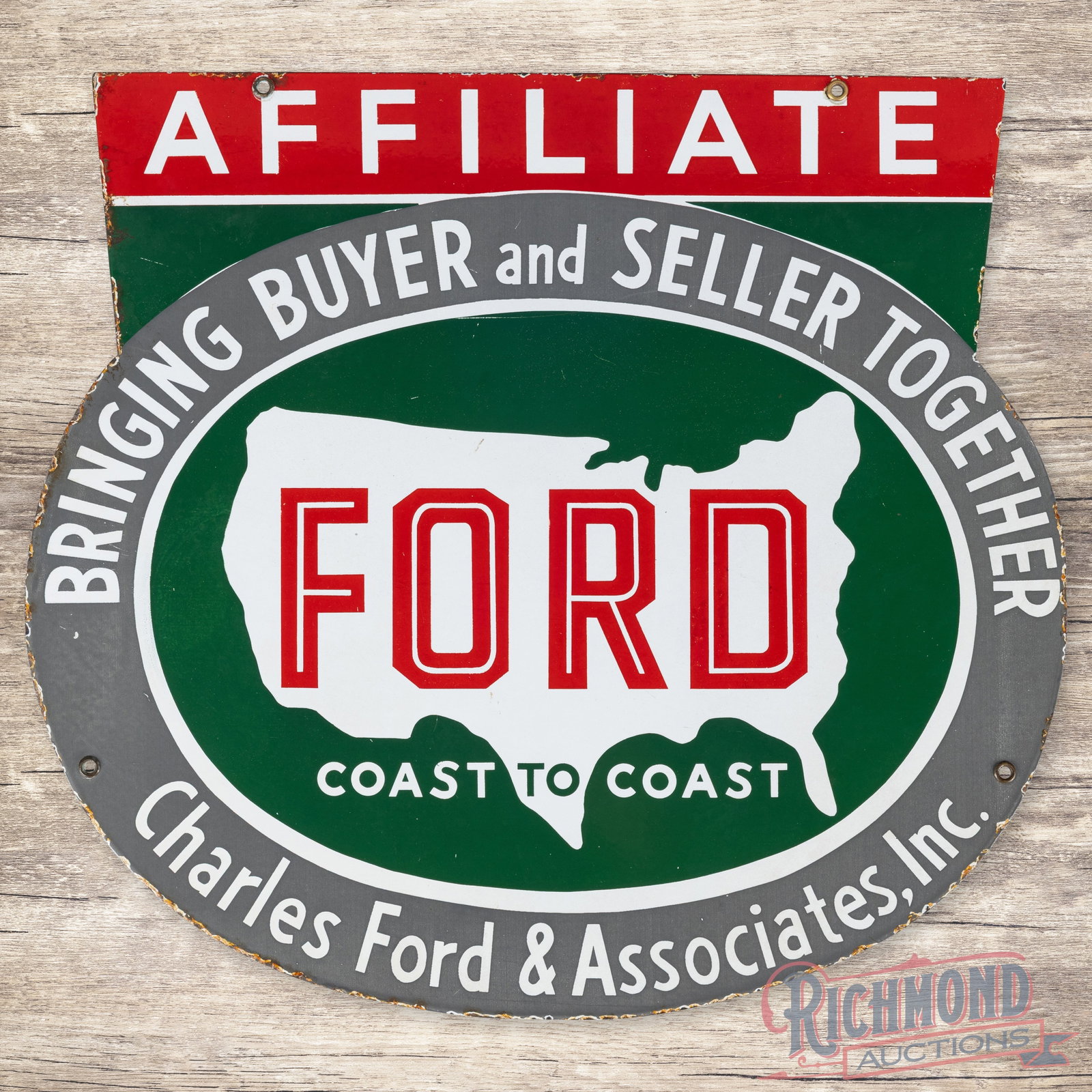 Ford Affiliate Coast to Coast Die Cut Single Sided Porcelain Sign: SSP (single sided porcelain) die cut sign has very good color and gloss. The display has light wear with small scuffs and fine scratches. The outer fields have slight cloudiness and the perimeter has 