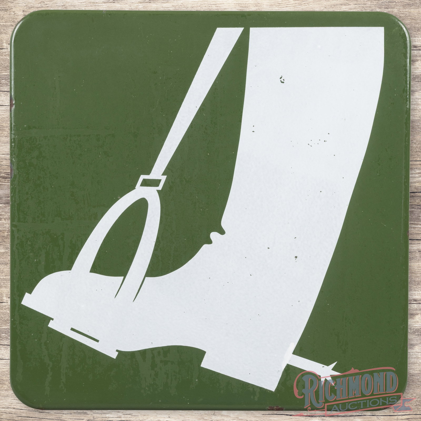Cowboy Boot w/ Spur 16" Single Sided Porcelain Sign: SSP (single sided porcelain) rolled edge sign has good color. The display has tiny chips with discoloration and cloudiness which is primarily in the green porcelain enamel. The perimeter has chips alo