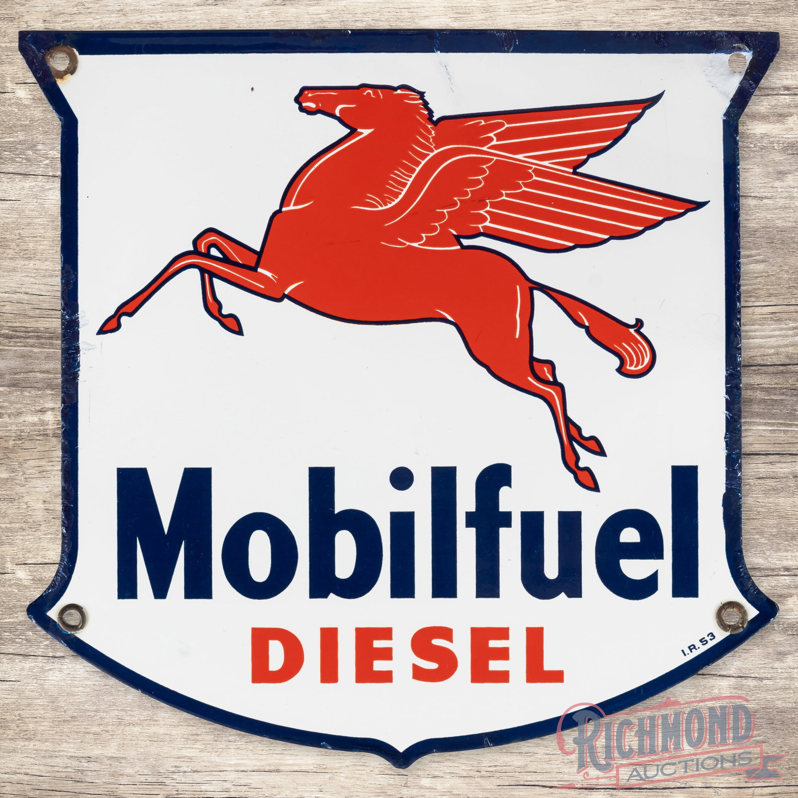 1953 Mobilfuel Diesel Single Sided Porcelain Gas Pump Plate Sign: SSP (single sided porcelain) pump plate has excellent color and gloss. The field is clean. The perimeter has a minor bend on the upper right corner with color-matched chips at the mounting holes and e