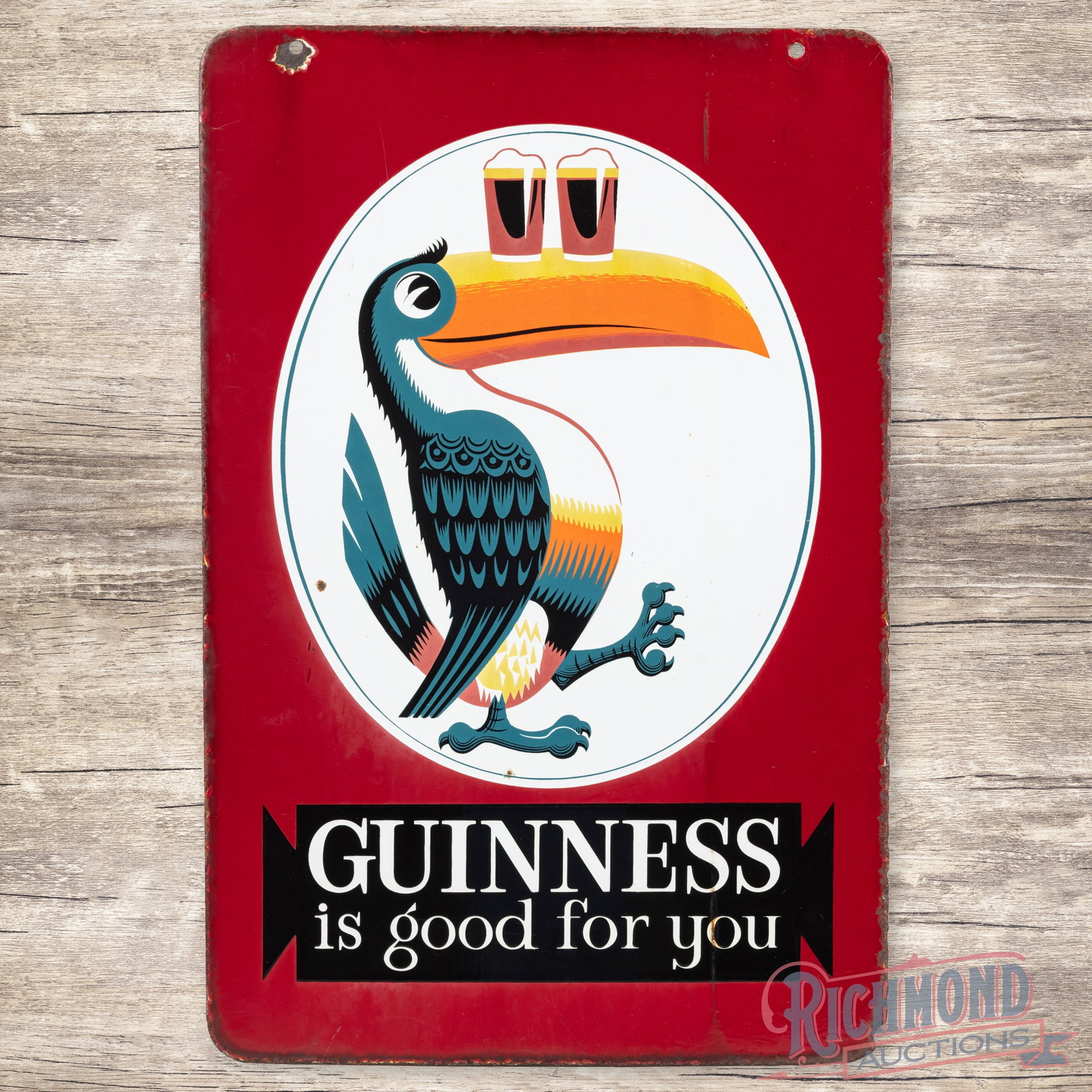 Guinness Beer Is Good for You Double Sided Porcelain Sign w/ Toucan: DSP (double sided porcelain) sign has good color and gloss. The sign has a wonderful graphic of the Guinness Toucan with glasses of beer on both sides. The display has two tiny chips in the lower left