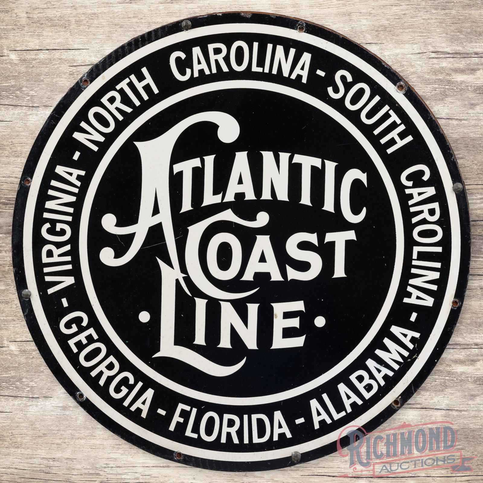 Atlantic Coast Line Railroad Sign North South Carolina Georgia Florida Alabama Virginia: SST (single sided tin) sign with an added wooden reverse has excellent color and shine. The display has light wear with fine scratches. The perimeter has minor wear the mounting holes with small paint