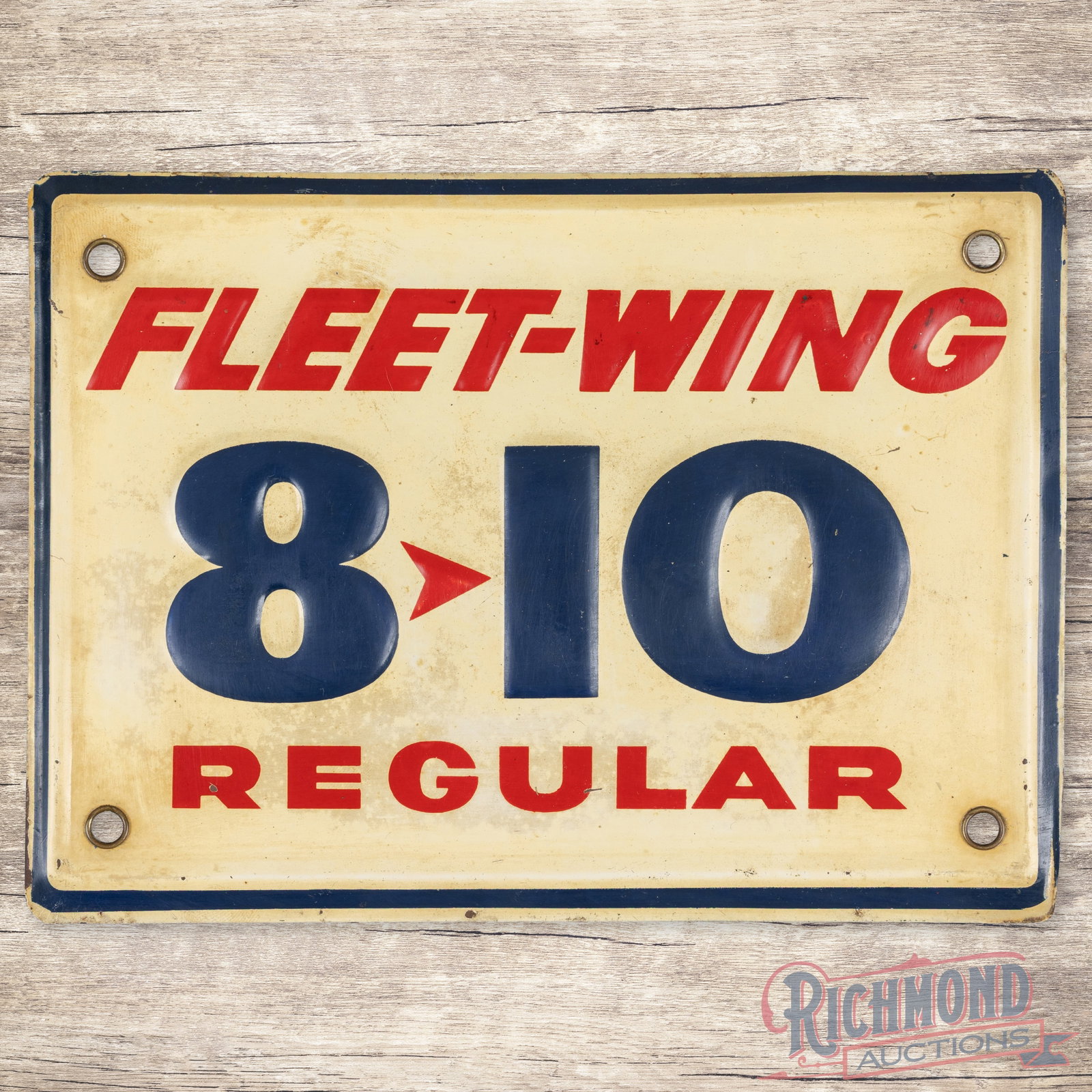 Fleet Wing 8-10 Regular Gasoline Emb. Single Sided Tin Pump Plate Sign: SST (single sided tin) embossed self-framed pump plate has good color and shine. The display has light wear with toning to the white painted areas. The perimeter has small paint chips with light wear 