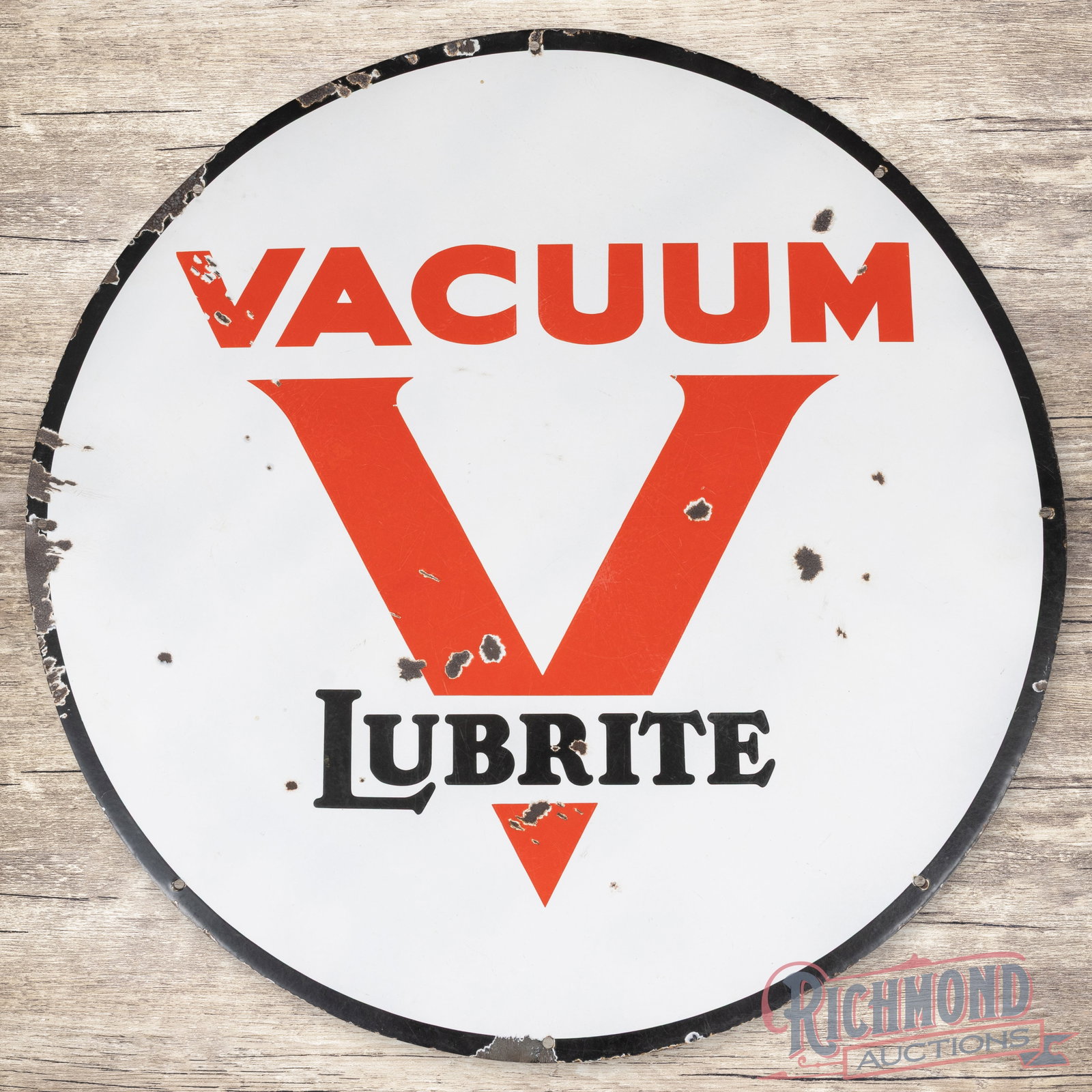 Vacuum Lubrite Gasoline 42" Single Sided Porcelain Sign w/ Logo: SSP (single sided porcelain) sign has very good color and gloss. The display has light wear with chips and minor crazing. The perimeter has additional chips with a few small bends along the outer edge