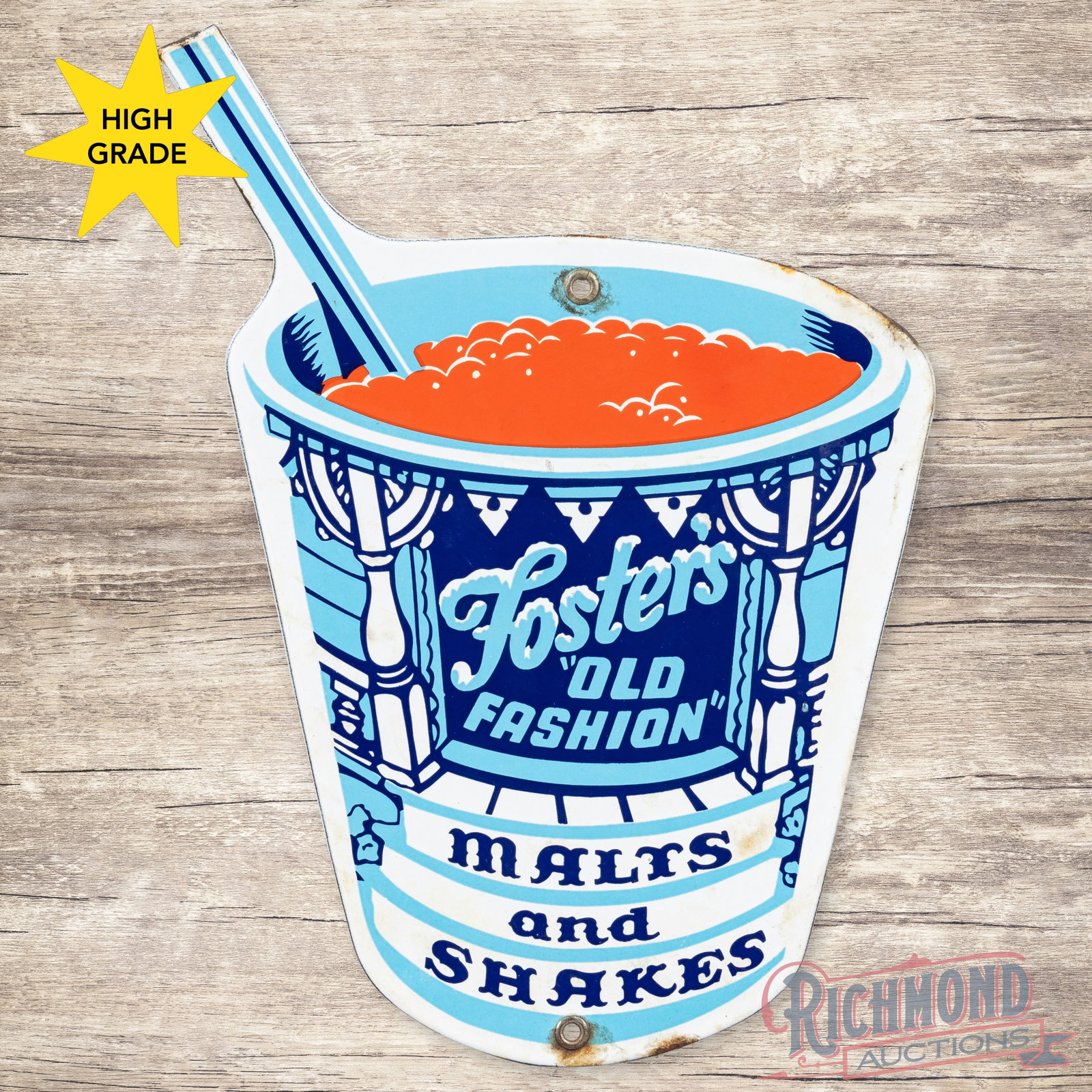 Foster's "Old Fashion" Malts and Shakes Die Cut Single Sided Porcelain Sign: SSP (single sided porcelain) sign has very good color and gloss. The display is very clean overall with small areas of discoloration in the lower and outer fields. The perimeter has light wear with mi