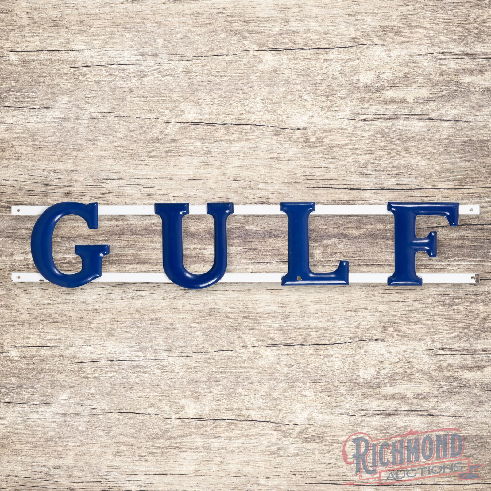 Gulf Gasoline Service Station 5.5' Convex Single Sided Porcelain Letter Sign: SSP (single sided porcelain) convex letter sign with porcelain channel has very good color and gloss. The display has a chip on the lower edge of the "L" with other small chips along the edges of the 