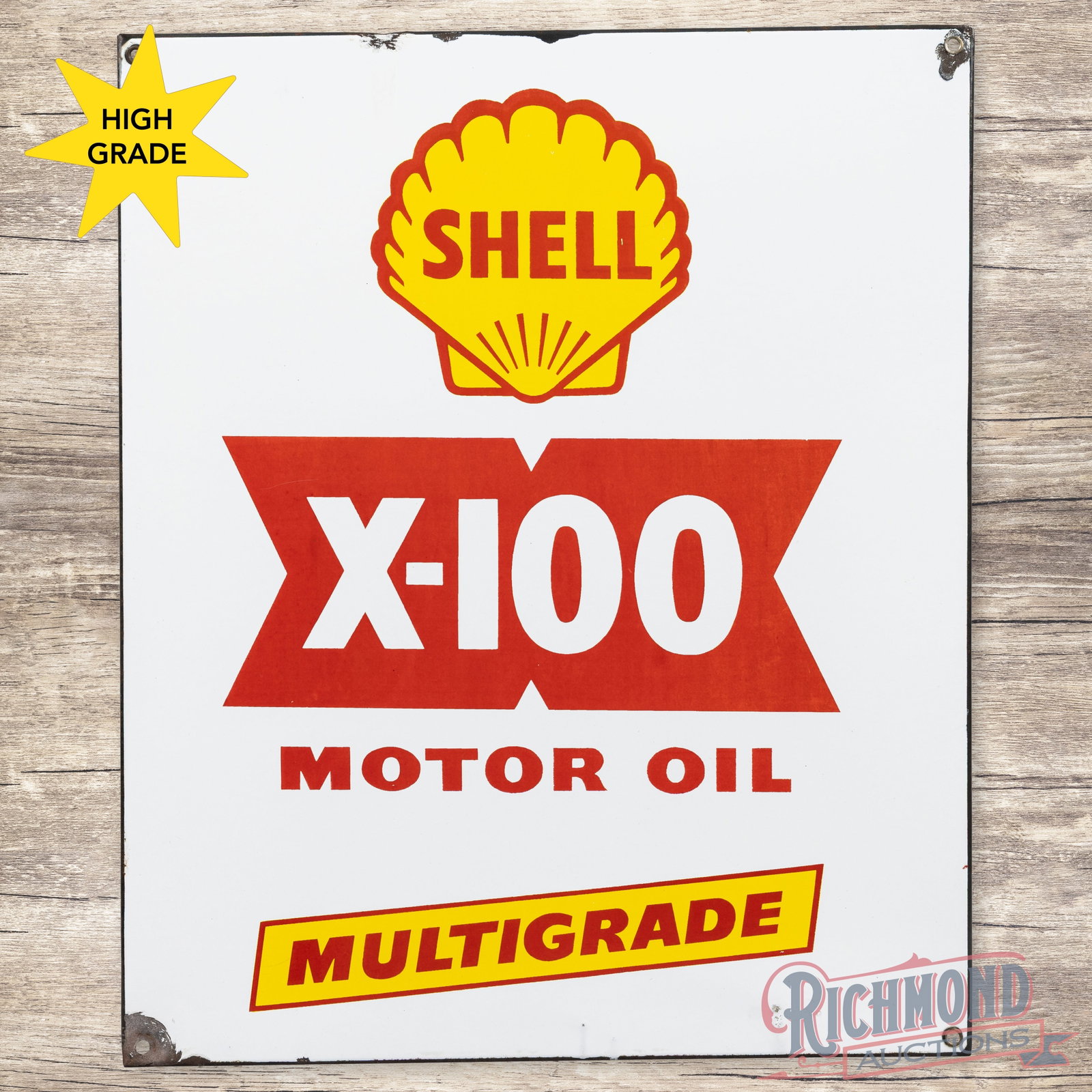 Shell X-100 Multigrade Motor Oil Single Sided Porcelain Logo Sign: SSP (single sided porcelain) rolled edge sign has excellent color and gloss. The field has a tiny nick in the second "L" of Shell with areas of color variation in the red porcelain enamel. The perimet