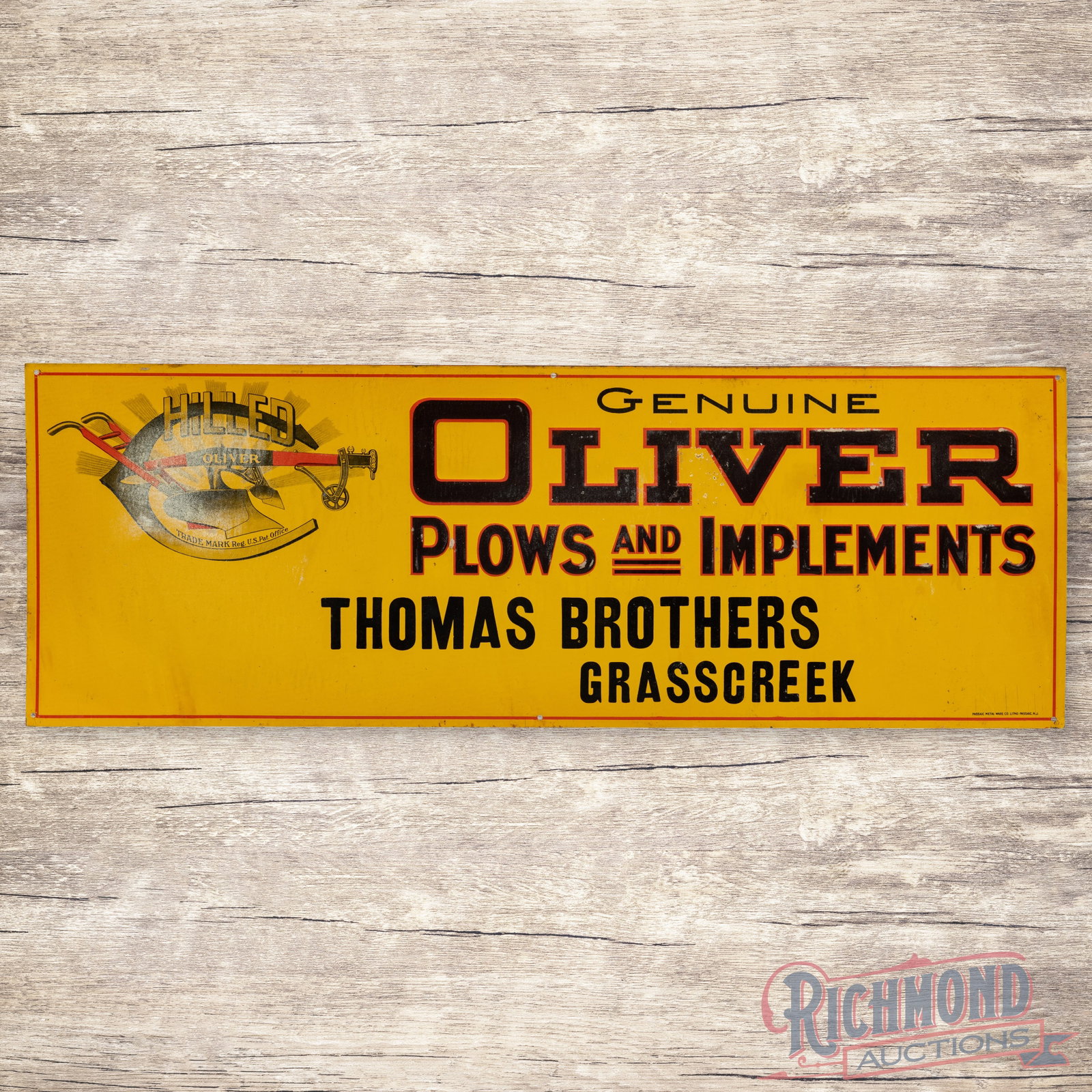 Oliver Plows and Implements Emb. Single Sided Tin Sign Thomas Brothers Grasscreek: SST (single sided tin) embossed sign has very good color and shine. The field has light wear with tiny paint chips, paper residue and discoloration in the logo. The lower left corner has a light bend 