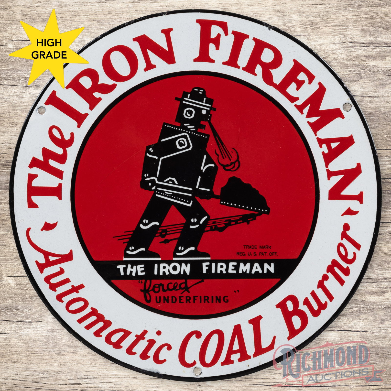 The Iron Fireman Automatic Coal Burner 12" Single Sided Porcelain Logo Sign: SSP (single sided porcelain) sign has excellent color and gloss. The fields have light surface wear with fine scratches. The perimeter has small chips along the outer edges. All in all a tough to find