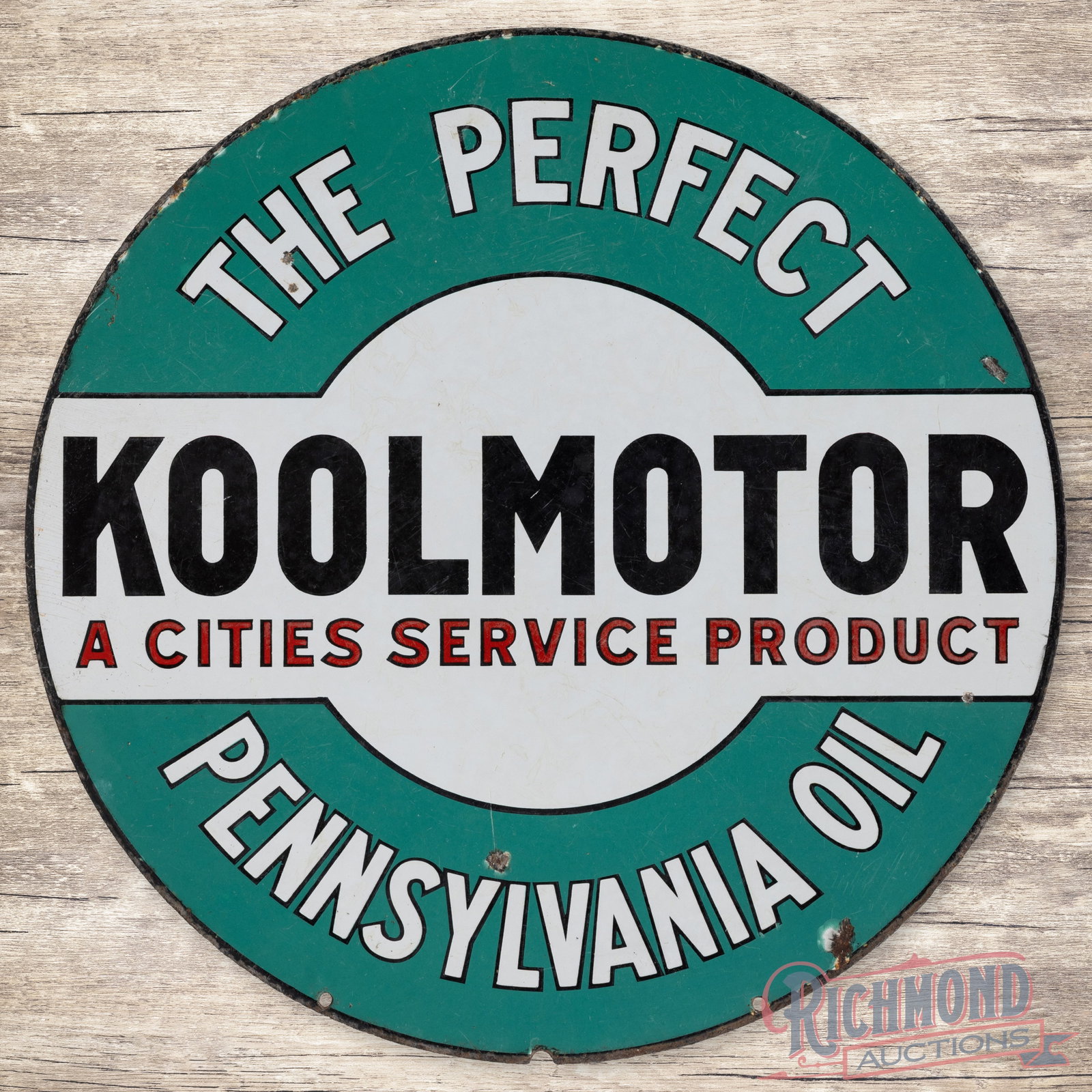 Cities Service Koolmotor The Perfect Pennsylvania Oil 24" Double Sided Porcelain Sign: DSP (double sided porcelain) sign has good color and gloss. The display has surface wear with small chips and an area of cloudiness in the upper center field. The perimeter has edge wear with chips an