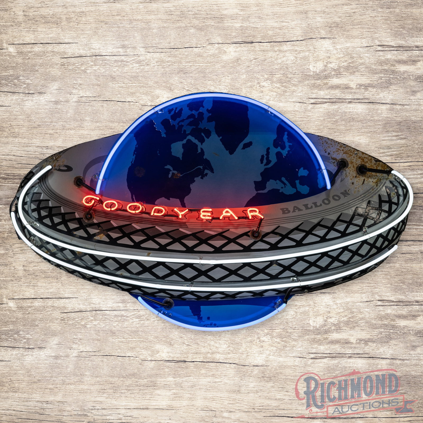 Goodyear Balloon Tire 4' Die Cut Single Sided Porcelain Neon Sign: SSP (single sided porcelain) sign with added neon and a metal can has good color and gloss. The sign has been trimmed from a larger sign. The display has surface wear with color matched chips. The out