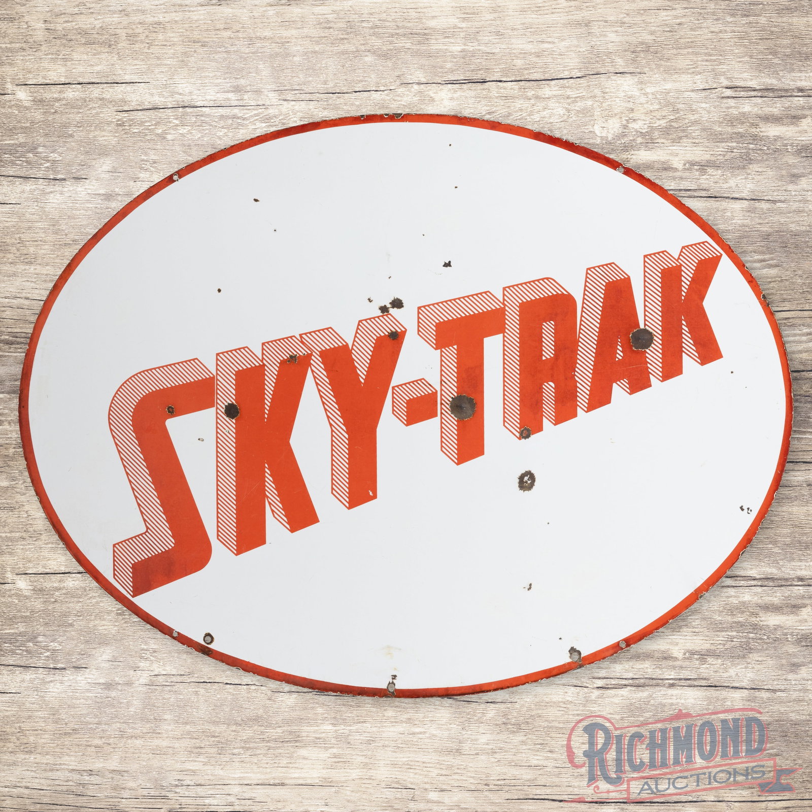 Scarce Sky Trak Gasoline 4' Double Sided Porcelain ID Sign: DSP (double sided porcelain) sign has good color and gloss. The display has chips with light surface wear. The upper left edge has a slight bend with crazing which proceeds to the center upper field. 