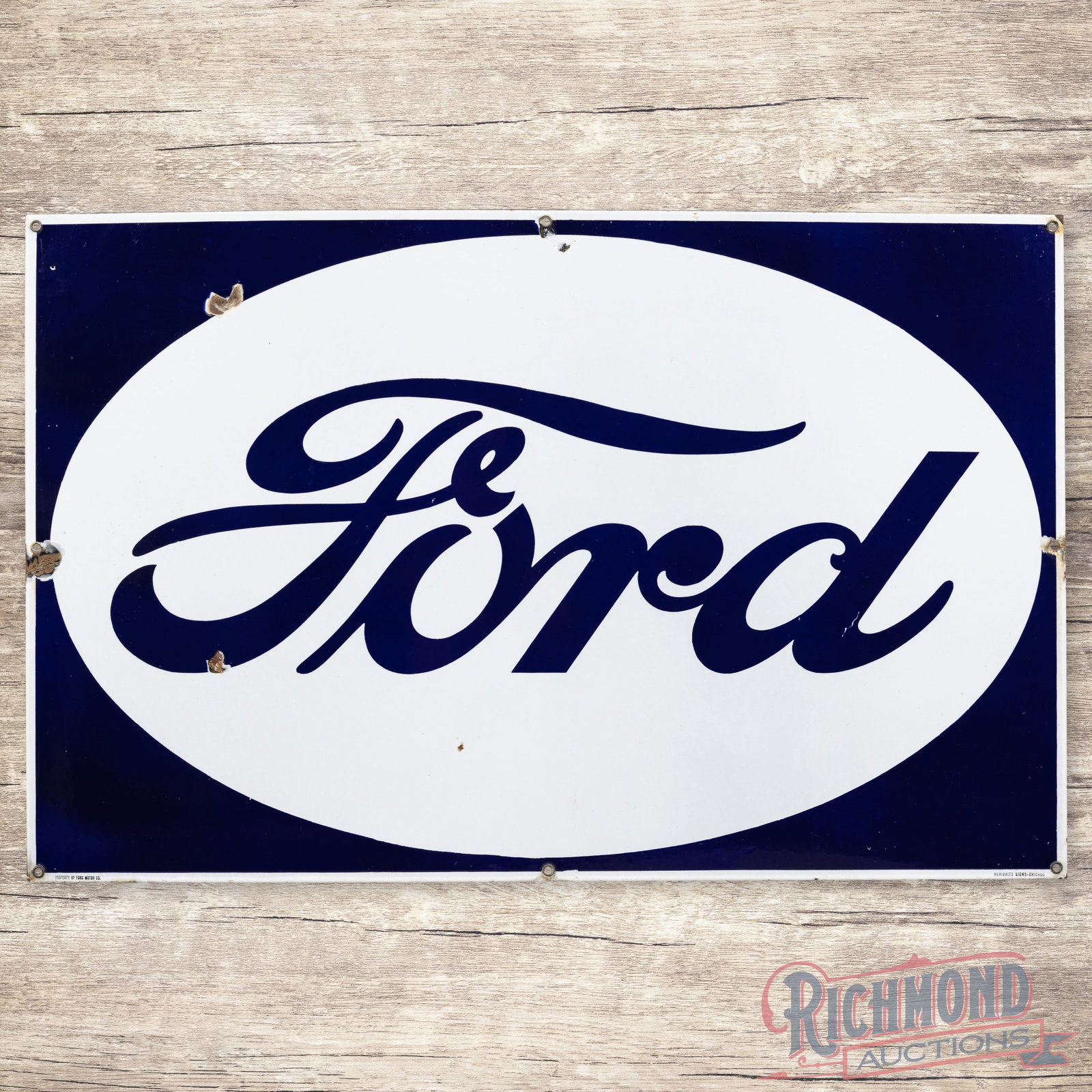 Ford Automobiles Reverse Color Single Sided Porcelain Logo Sign: SSP (single sided porcelain) sign has excellent color and gloss. The display has light wear with a chip in the "F" and an eraser-sized chip in the lower field. The outer fields and perimeter have addi