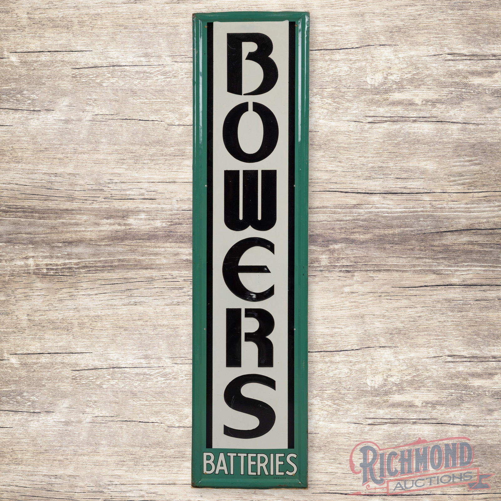 Bowers Batteries Emb. Single Sided Tin Sign: SST (single sided tin) embossed self-framed sign has excellent color and shine. The display has scuffs in the "E" with fine scratches in the lower fields. The perimeter has minor edge bends with small