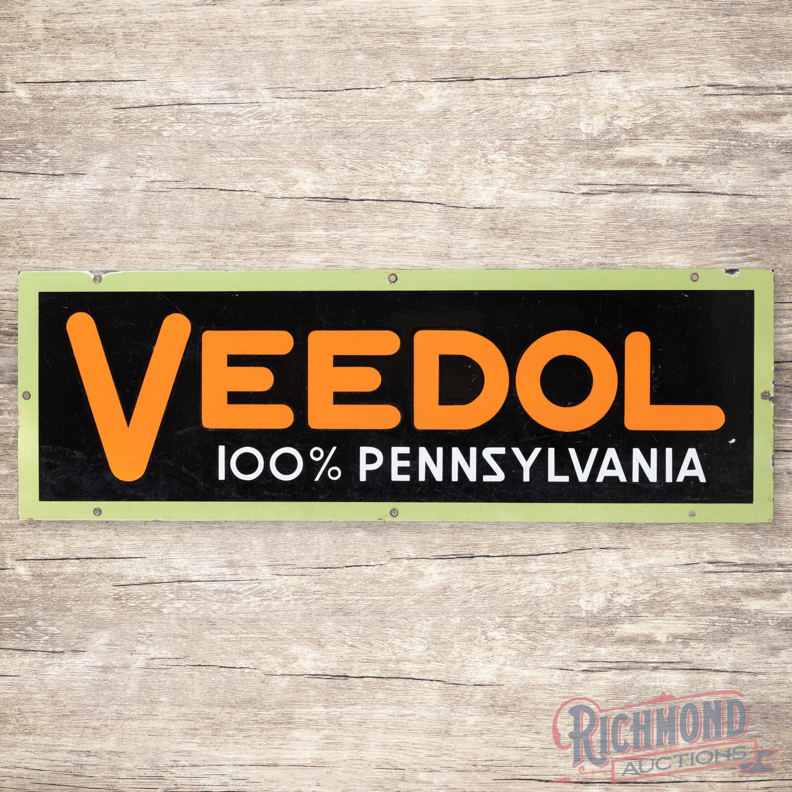 Veedol 100% Pure Pennsylvania Motor Oil 42" Single Sided Porcelain Sign: SSP (single sided porcelain) sign has very good color and gloss. The display has light wear with fine scratches, tiny nicks and areas of slight cloudiness to the black porcelain enamel. The right oute