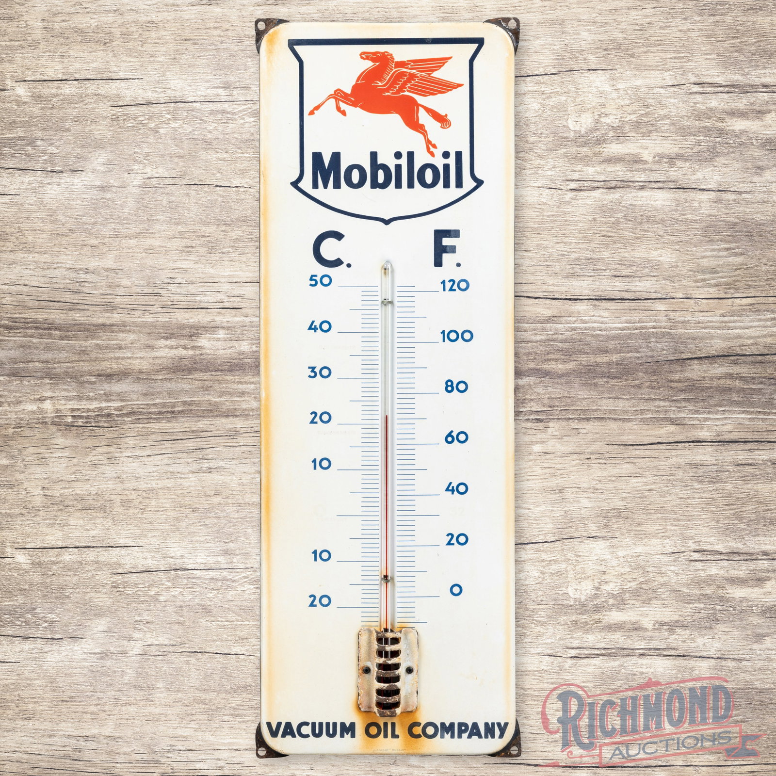 Mobiloil Vacuum Oil Company 23" Single Sided Porcelain Thermometer w/ Pegasus: SSP (single sided porcelain) thermometer has good color and gloss. The tube is present. The fields have light wear with discoloration in the lower lettering and outer edges. The perimeter has small ch