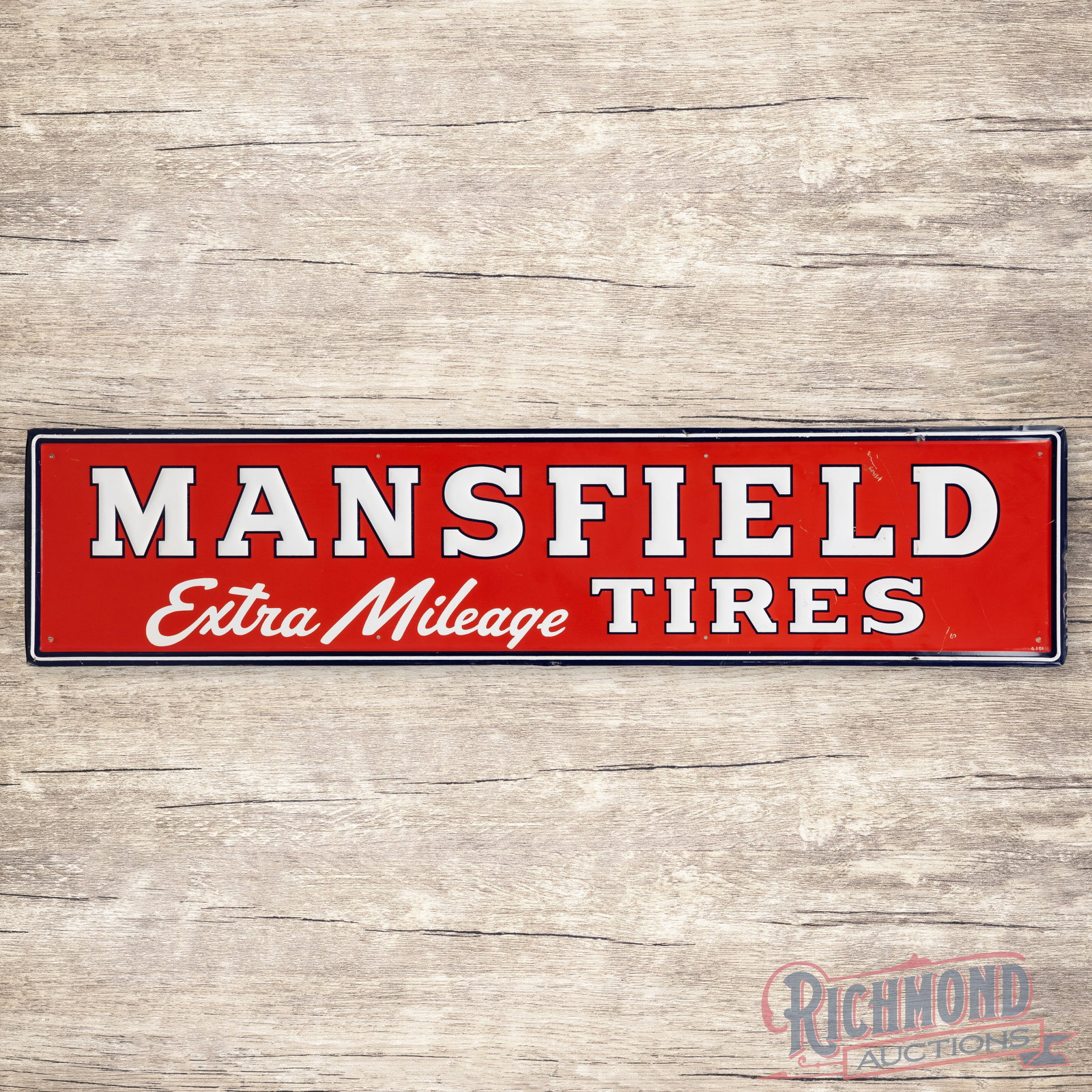 Mansfield Tires "Extra Mileage" 5' Emb. Single Sided Tin Sign: SST (single sided tin) embossed self-framed sign has excellent color and shine. The field has light wear with scuffs and fine scratches in the right fields. The perimeter has small paint chips and min