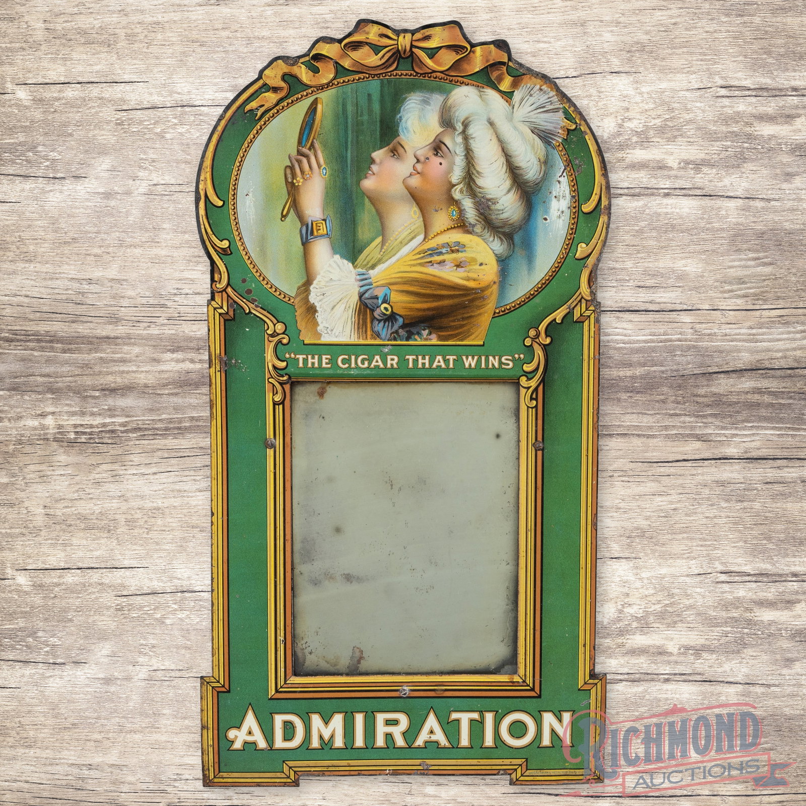 Early Admiration "The Cigar That Wins" Single Sided Tin Mirror Sign w/ Ladies: SST (single sided tin) die cut sign with mirror and easel back has very good color and shine. The center mirror has areas of discoloration and oxidation. The painted portion has light wear with areas 