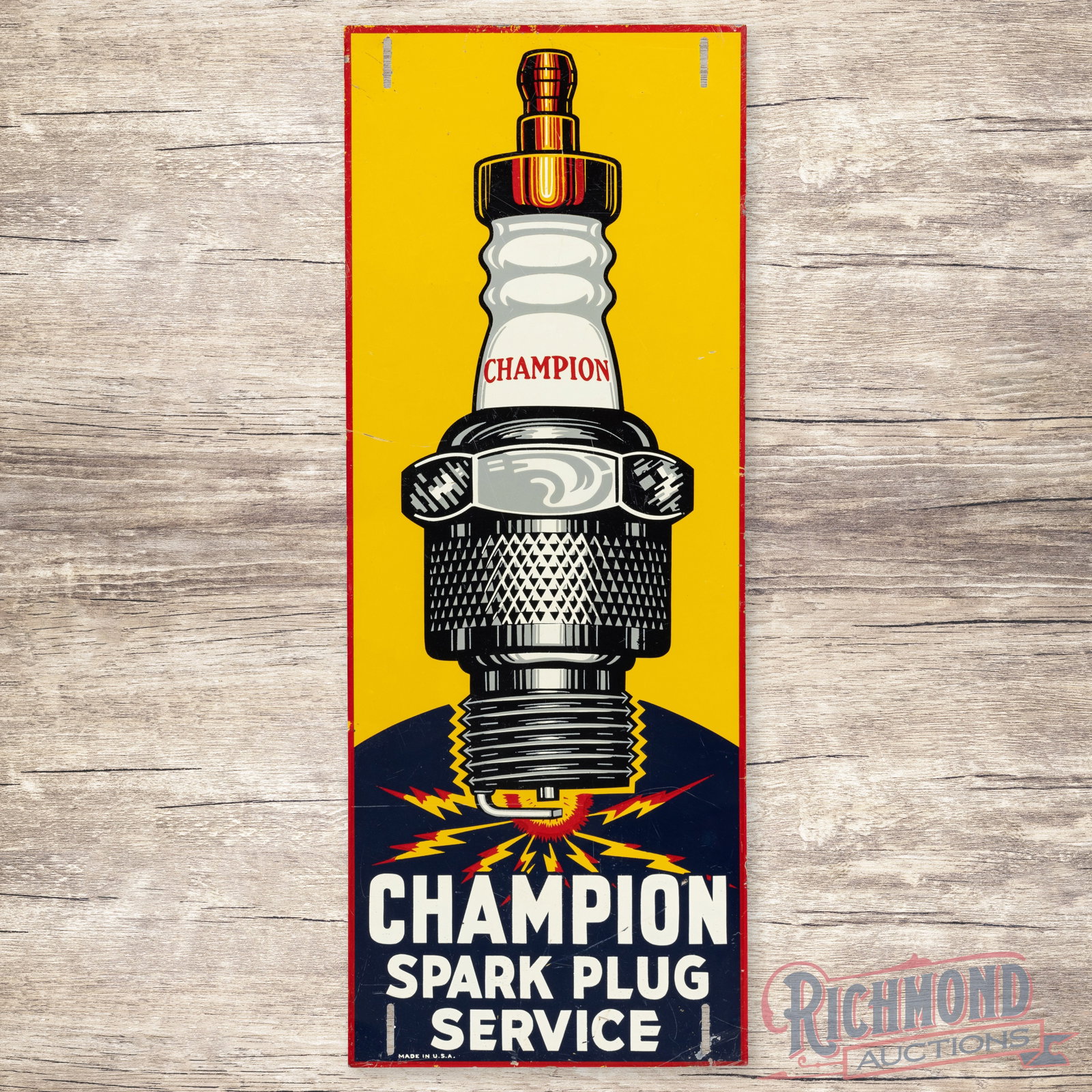 Champion Spark Plug Service Vertical Single Sided Tin Sign w/ Plug: SST (single sided tin) sign has very good color and shine. The field has light wear with faint bends and fine scratches in the lower fields. The perimeter has paint chips with other light wear. Marked