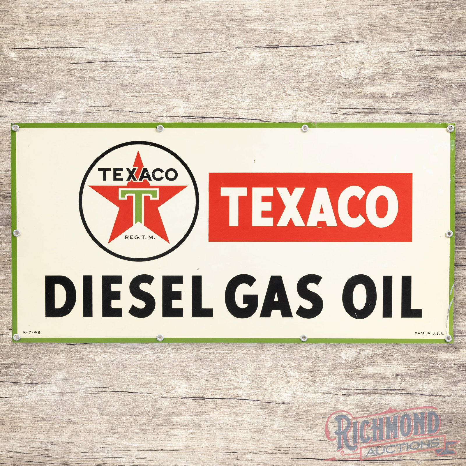 1949 Texaco Diesel Gas Oil Single Sided Tin Sign w/ Logo: Scarce SST (single sided tin) sign has excellent color and shine. The field exhibits light wear with tiny paint chips. The perimeter has small edge bends with an area of paint loss on the lower right 