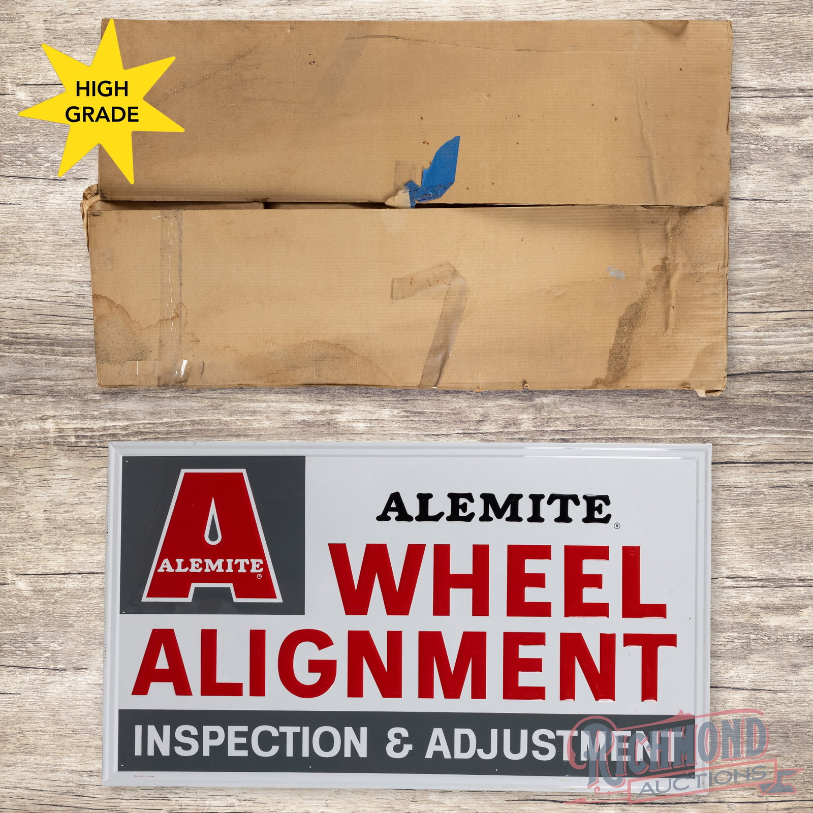 NOS Alemite Wheel Alignment Emb. Single Sided Tin Sign w/ Original Box: SST (single sided tin) embossed self-framed sign with the original box has excellent color and shine. The fields are clean with light paper marks. The perimeter has light storage wear with small bends