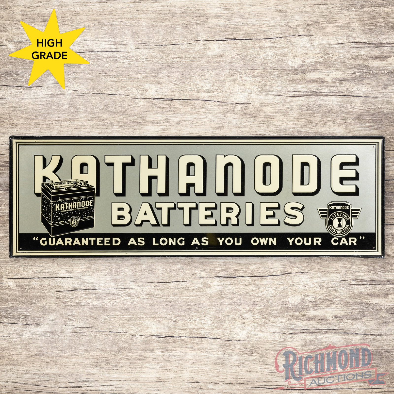 Outstanding Kathanode Batteries Emb. Single Sided Tin Sign w/ Logo: SST (single sided tin) embossed self-framed sign has excellent color and shine. The field is clean. The outer fields have a few minor imperfections and the perimeter has small scuffs and paint chips a