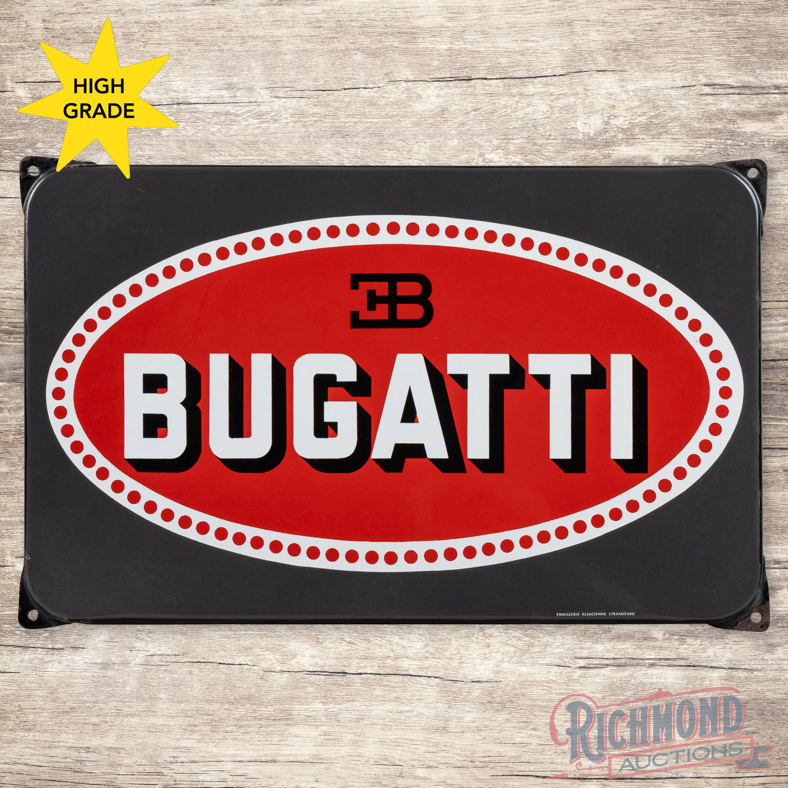 Bugatti Automobiles Single Sided Porcelain Logo Sign: SSP (single sided porcelain) rolled-edge sign has excellent color and gloss. The field is clean. The perimeter has small chips along the outer edges. Marked Emaillerie Alsacienne Strasbourg. All in al