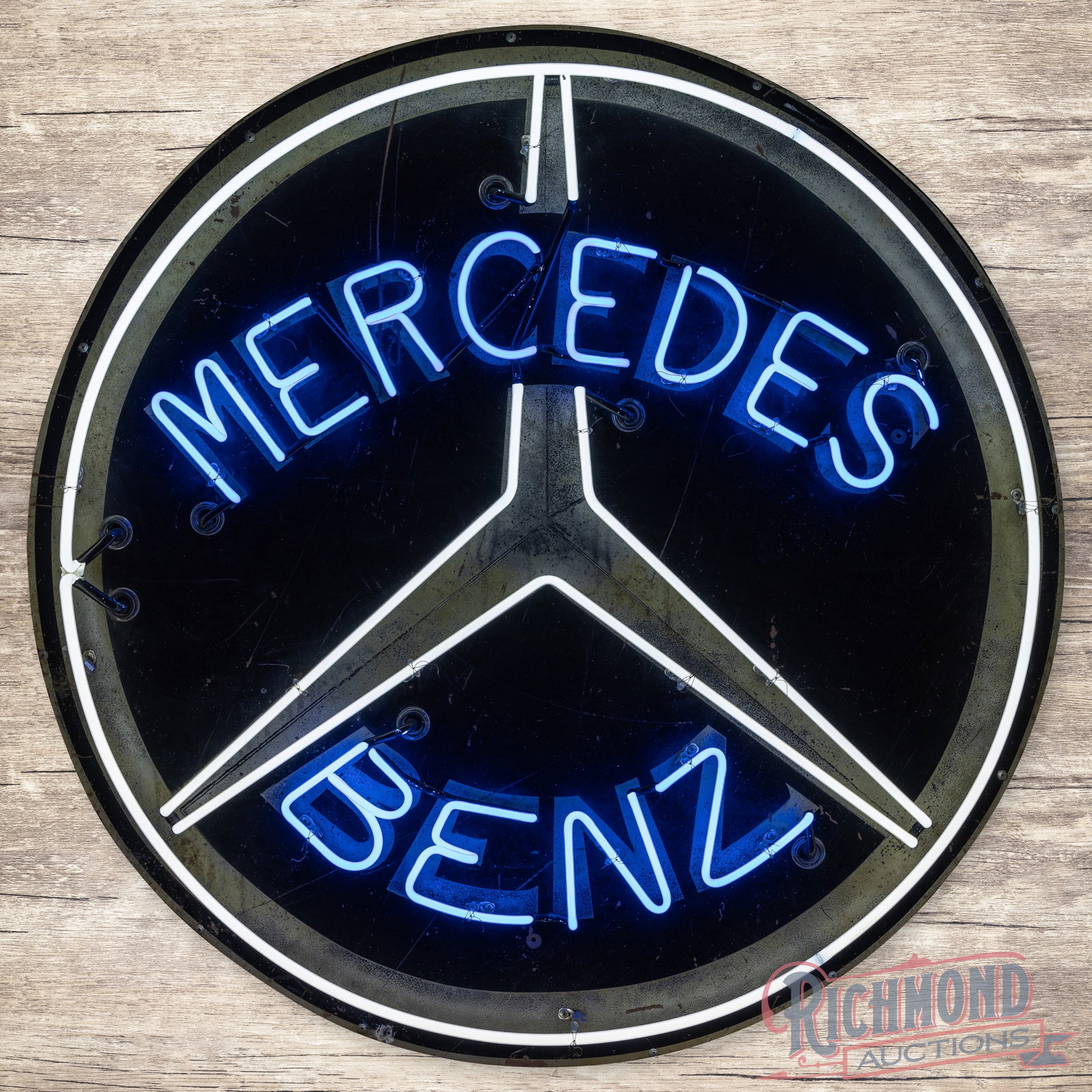 Mercedes Benz 48" Single Sided Tin Neon Logo Sign: SST (single sided tin) sign with added neon and a new metal can has good color and shine. The display has surface wear with oxidation, fine scratches, fading and unused stand support holes. The perime