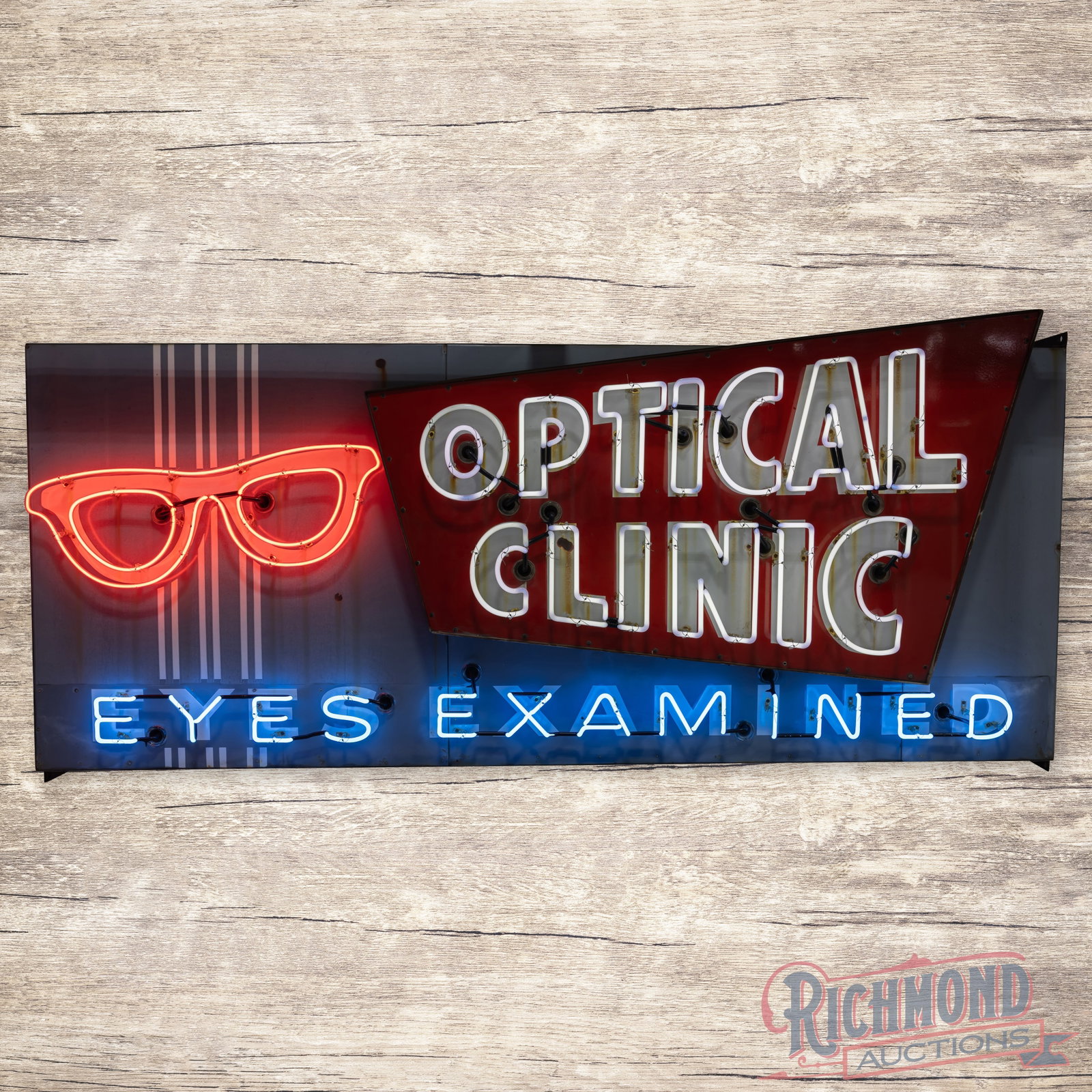 Optical Clinic Eyes Examined 3D 8.5' Single Sided Porcelain Factory Neon Sign w/ Glasses: SSP (single sided porcelain) three-dimensional factory neon sign with the original metal can has good color. The display has chips with areas of discoloration and cloudiness which is more prominent in