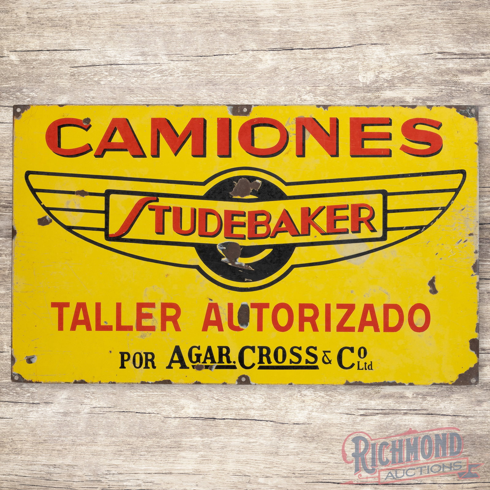 Studebaker Authorized Truck Repairs Camiones Taller Autorizado: Unique foreign Studebaker Truck SSP (single sided porcelain) sign shows general signs of wear. Some chipping and scratches throughout. This is a seldom seen sign that would be great for any automotive