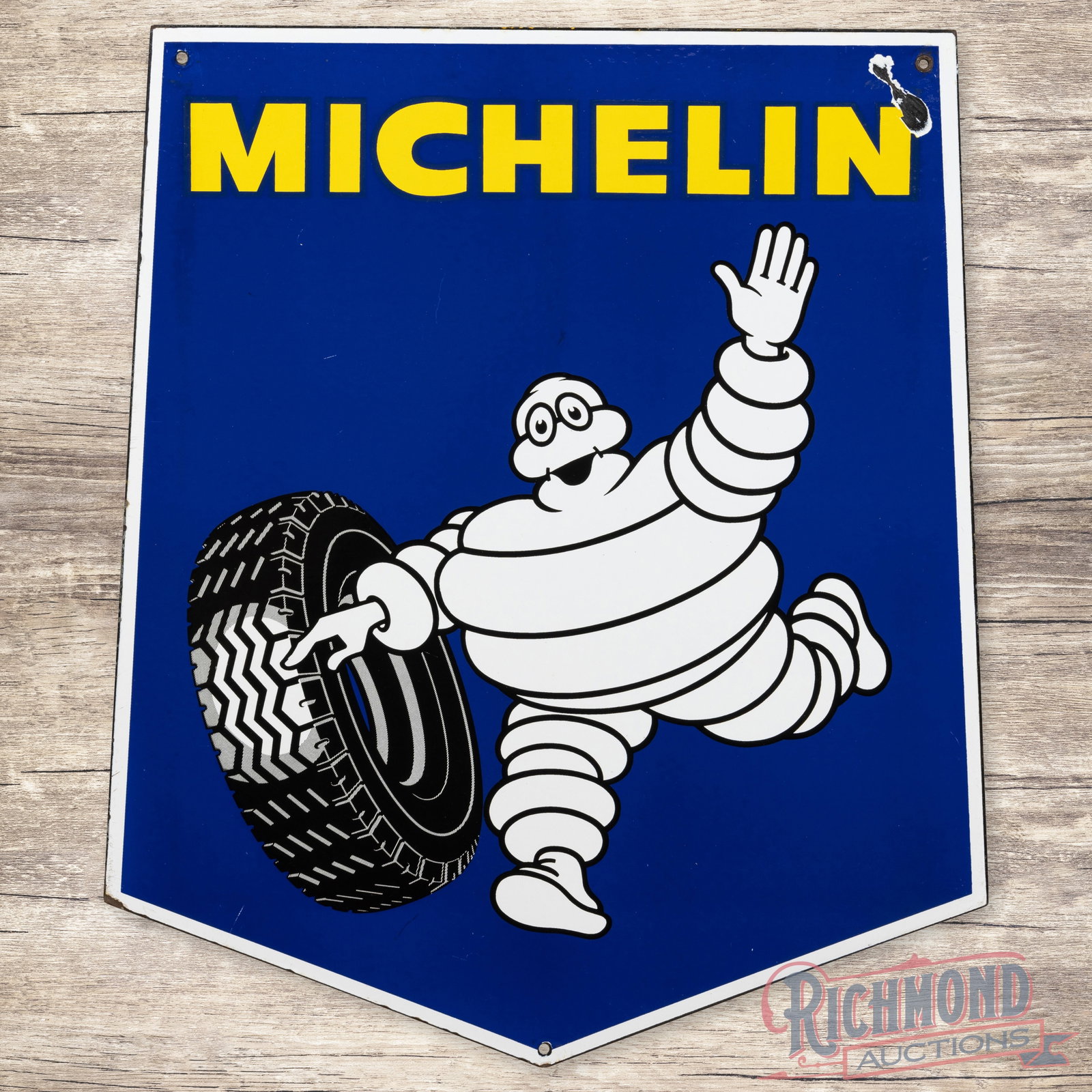 Michelin Tires Die cut Double Sided Porcelain Sign w/ Bibendum: DSP (double sided porcelain) Die Cut sign with excellent color and gloss. Side one is very nice with mild surface wear and a small chip in the field. Side two is similar with larger chipping in top co