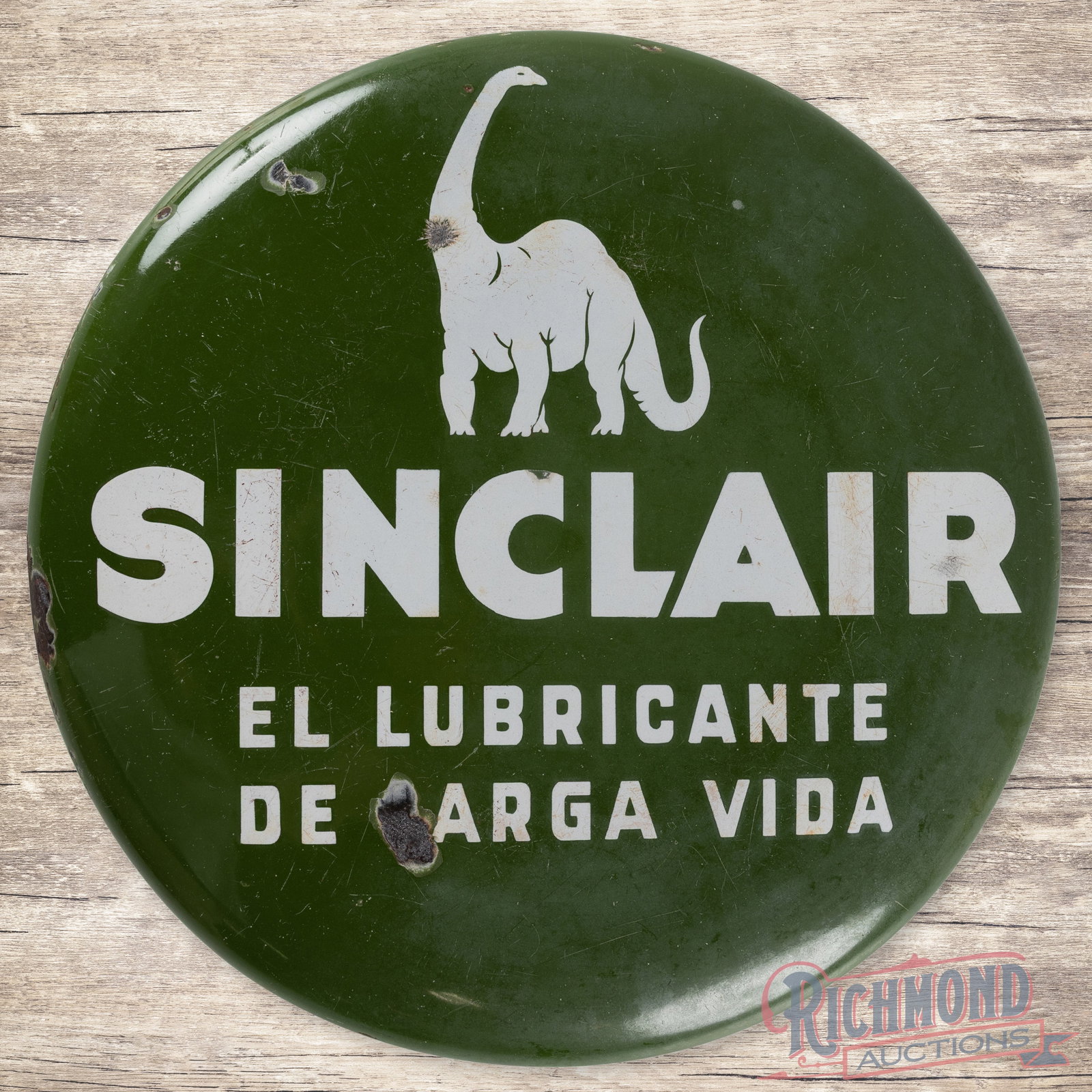 Sinclair El Lubricante De Larga Vida Single Sided Porcelain Button Sign: Scarce Sinclair SSP (single sided porcelain) Button Sign. Seldom seen with several chips in the field and surface scratching. Edges have larger areas of chipping. 18" H X 18" W. Condition: 7.9 All ite