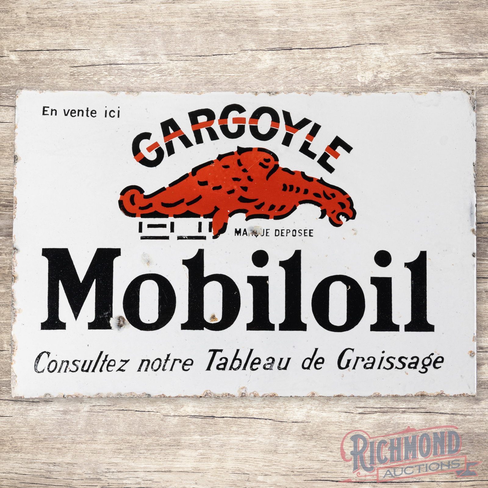 Mobiloil Gargoyle Double Sided Porcelain Flange Sign: DSP (double sided porcelain) Flange sign has excellent color and gloss. Side one has a few minor chips in the field with more wear around the edges including the flange edge. Some areas of crazing. Si