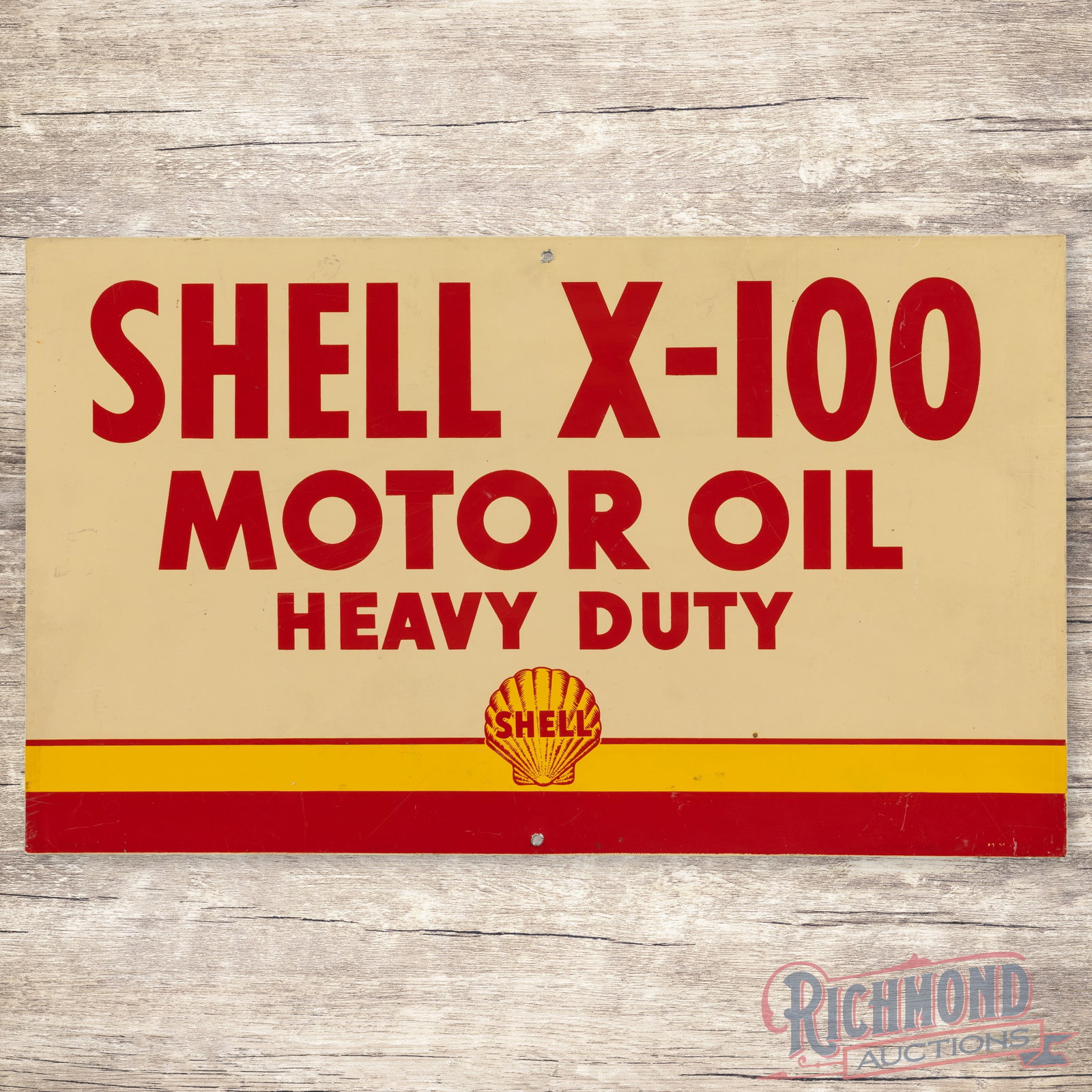 Shell X-100 Heavy Duty Motor Oil Double Sided Tin Logo Sign: DST (double sided tin) sign has excellent color and shine. Side #1 has light surface wear throughout with a small non-factory hole at the upper and lower edges. The reverse is in a similar condition t