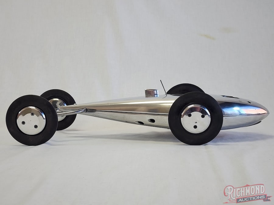 1946 Borden Streamliner Tether Car: In 1946 Warren Borden of Zion, Illinois produced this car commonly known as the Tear Drop, or V-car. Powered by a Dooling .61 engine, this car is complete with all internal components. A fine example 
