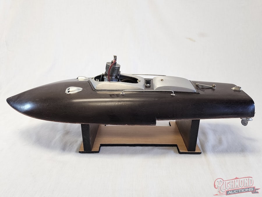 1947 Reuhl Hydroplane Tether Boat: This Hydroplane Tether boat was produced by Reuhl Products of Madison, Wisconsin in 1947. These hydroplane boats were produced out of Bektlite, a phenolic resin product, used in its characteristic