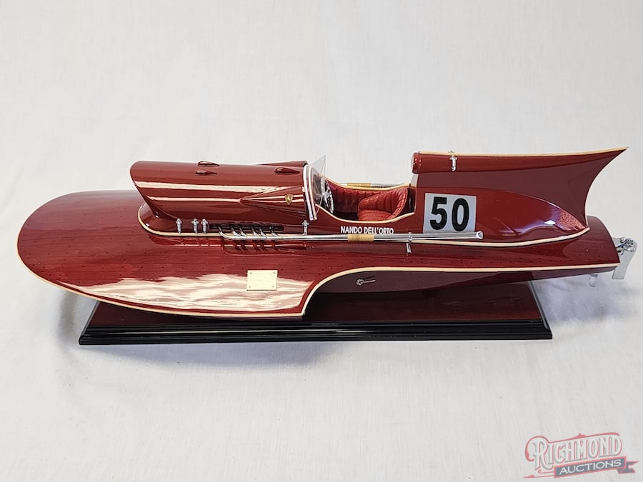 1953 Ferrari Reproduction Hydroplane Tether Boat: Designed by Achilles Castoldi and complete with certificate of authenticity. 22 inches long. Stand included. All items are guaranteed authentic by Richmond Auctions unless otherwise noted. Purchases a