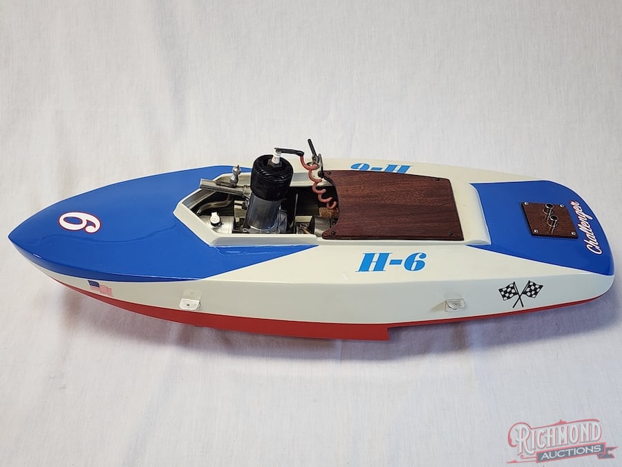Challenger H-6 Hydroplane Tether Boat: Beautifully painted. Complete with all of the accessories, this original wood hydroplane is powered by an Ohlsson .60 engine. 23 inches long. Stand included. All items are guaranteed authentic by