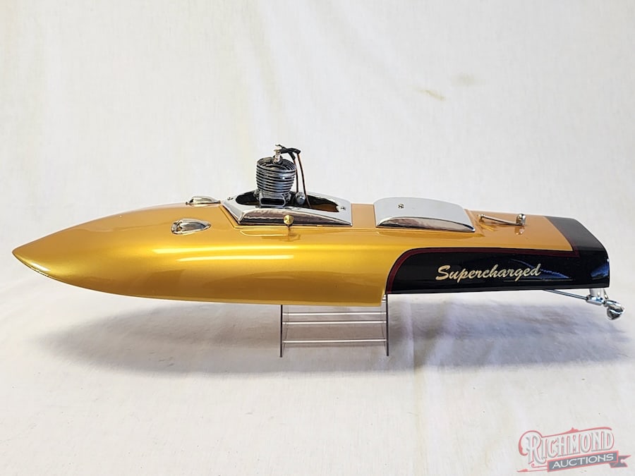 1947 Reuhl Hydroplane Tether Boat: This Hydroplane Tether boat was produced by Reuhl Products of Madison, Wisconsin in 1947. These hydroplane boats were produced out of Bektlite, a phenolic resin product, used in its characteristic dar