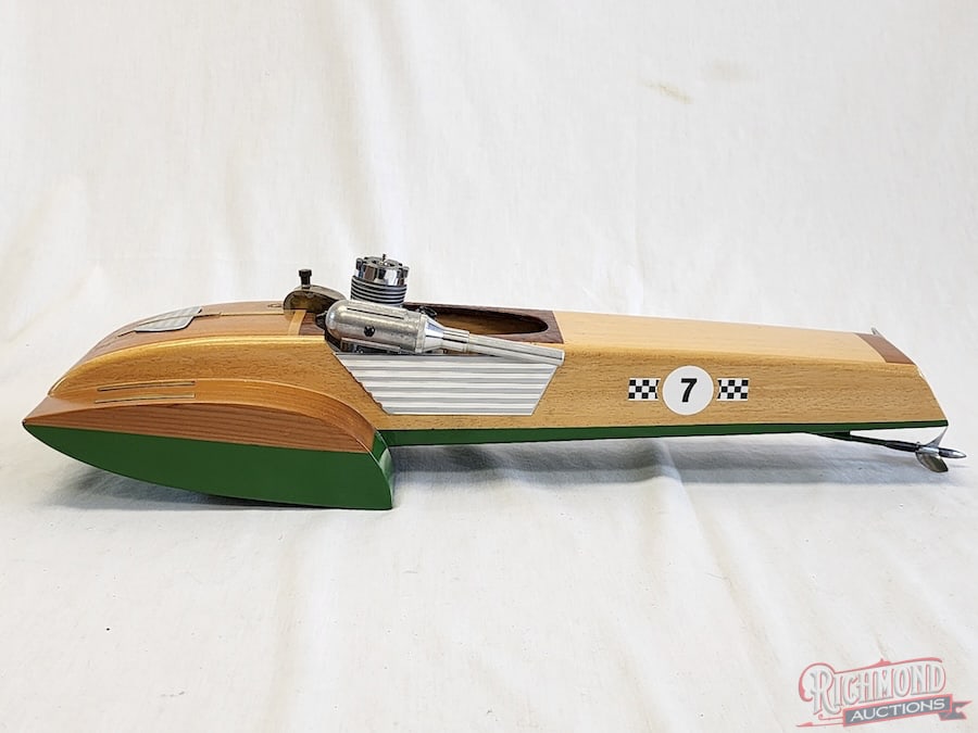 Custom Hydroplane Tether Boat: Beautiful wood finish. Powered by a Saito engine. 21 inches long All items are guaranteed authentic by Richmond Auctions unless otherwise noted. Purchases are eligible for free delivery to Fall Hershe