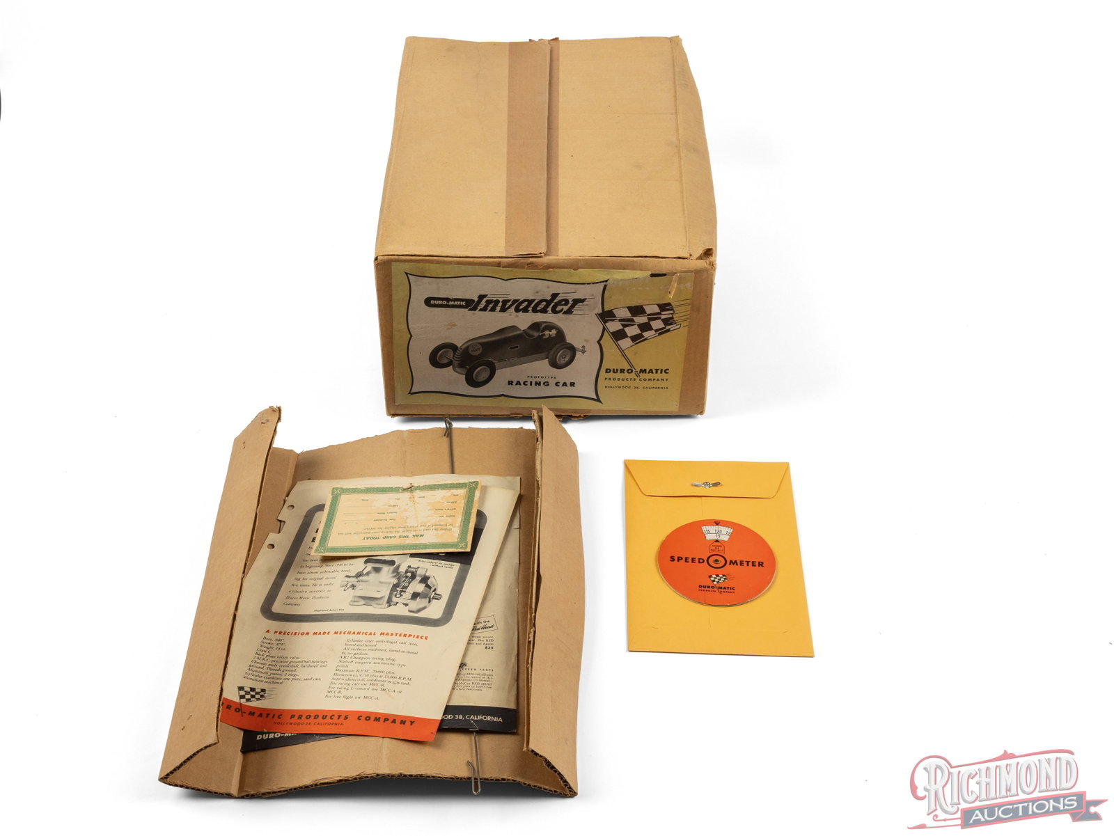 Late 1940's Duro-Matic McCoy Invader Prototype Racing Car Tether Car Empty Box w/ Accessories: Original empty one piece box. Retains label on end. Includes cardboard Speed-O-Meter dial, original warranty card mailer, a two model sheets. Also includes cardboard support and foam but unsure if ori