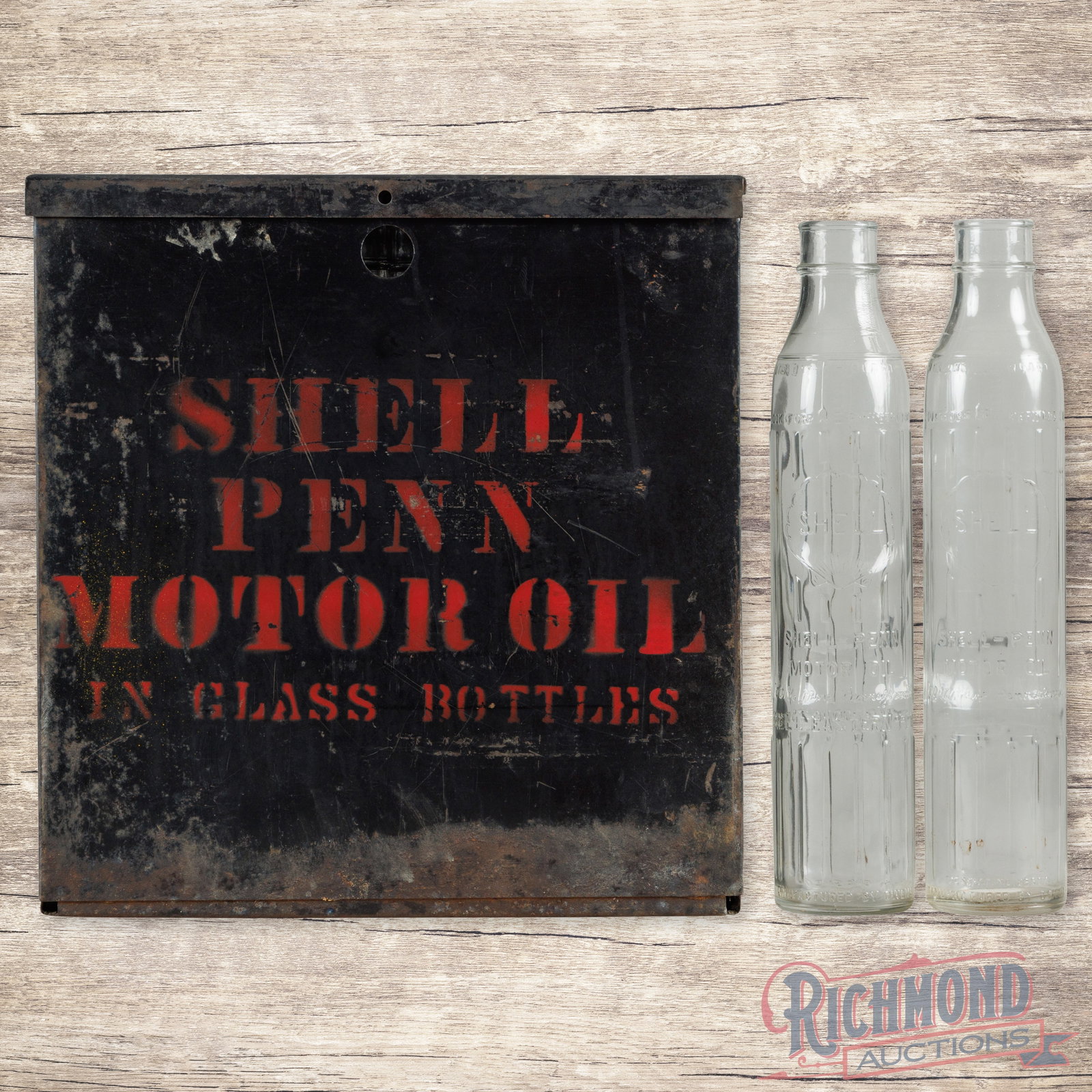 Shell Penn Motor Oil Group 16 Emb. Glass Oil Bottles w/ Metal Carrier: Large group of 16 embossed glass Shell Penn Motor Oil bottles with a metal display case. The bottles are in very good condition. The metal carrier is in good condition with red stenciled lettering on 