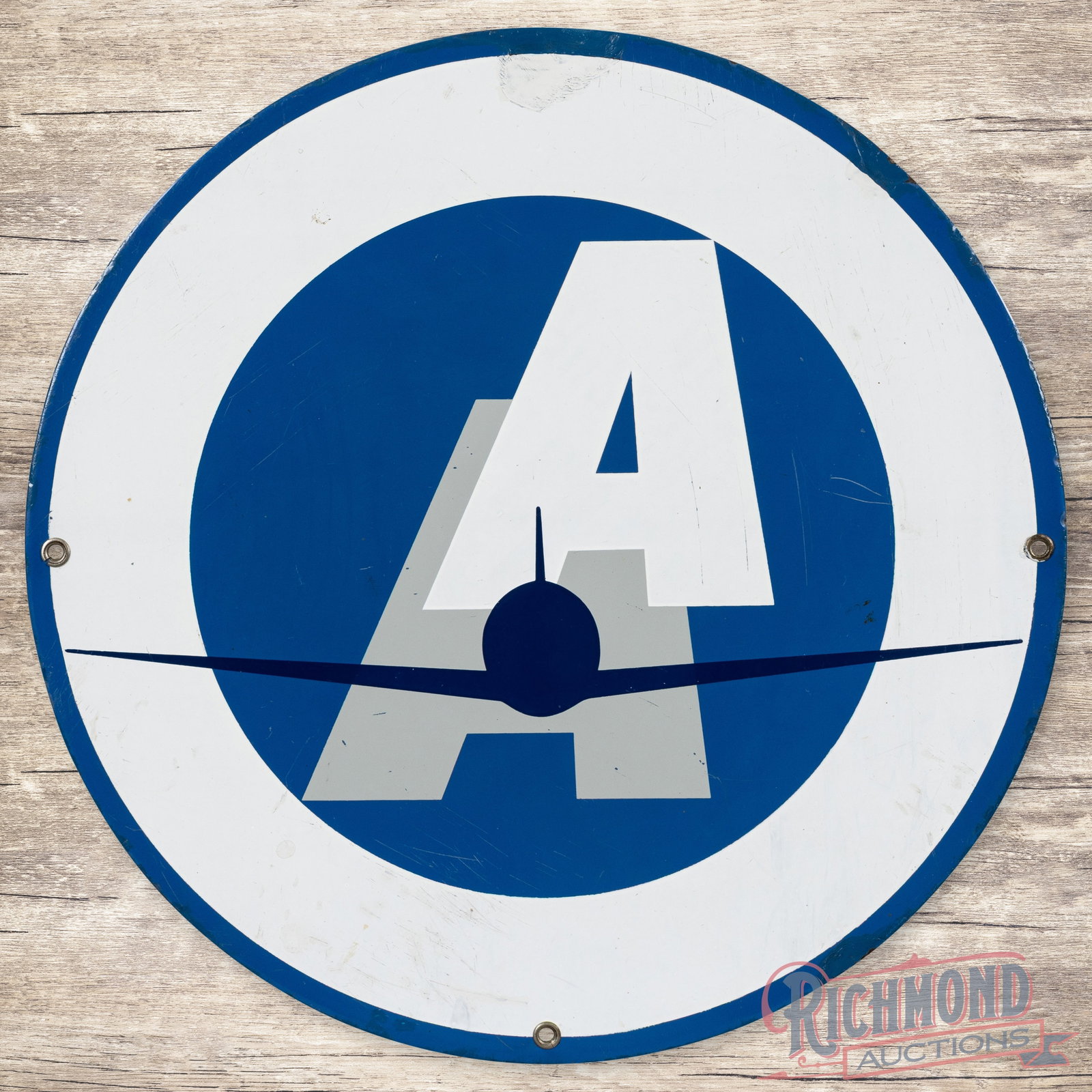 AA Aviation 18" Single Sided Porcelain Sign w/ Airplane: SSP (single sided porcelain) sign has good color and gloss. The display has surface wear with fine scratches. The outer fields have small areas of color match and the perimeter has larger areas along 