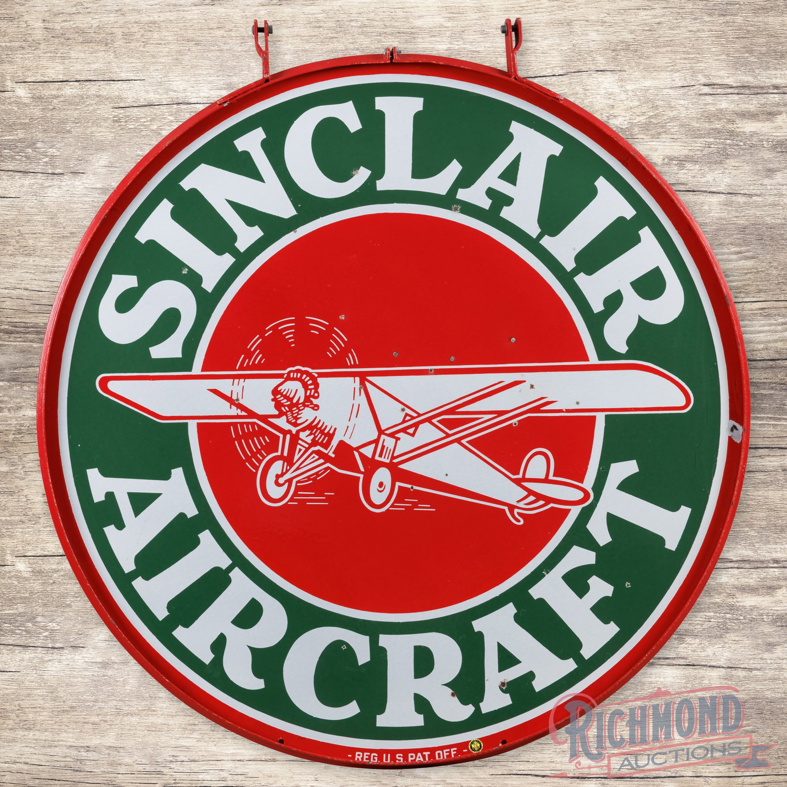 Iconic Sinclair Aircraft 48" Double Sided Porcelain Sign w/ Ring &: DSP (double sided porcelain) sign with a metal ring has excellent color and gloss. The display has tiny chips in the fields with additional chips along the outer edges. The reverse is in a similar con