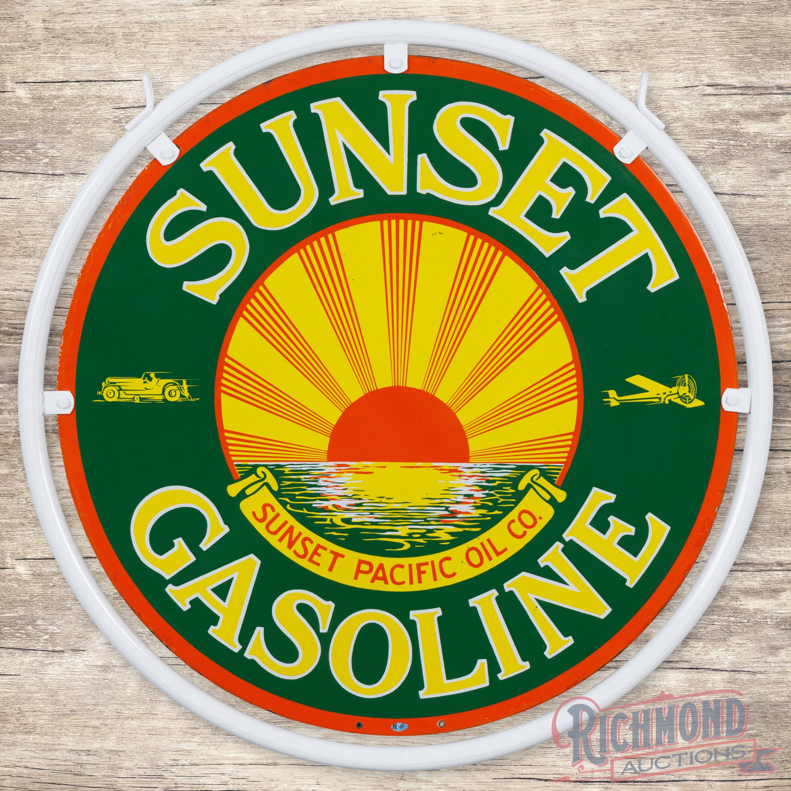 Scarce Sunset Gasoline "Sunset Pacific Oil Co." 30" Double Sided Porcelain Sign w/ Ring: Iconic DSP (double sided porcelain) sign with a metal ring has outstanding color and gloss. The sign features a large Sunset graphic flanked by a racecar and an airplane. Side #1 has minor surface imp