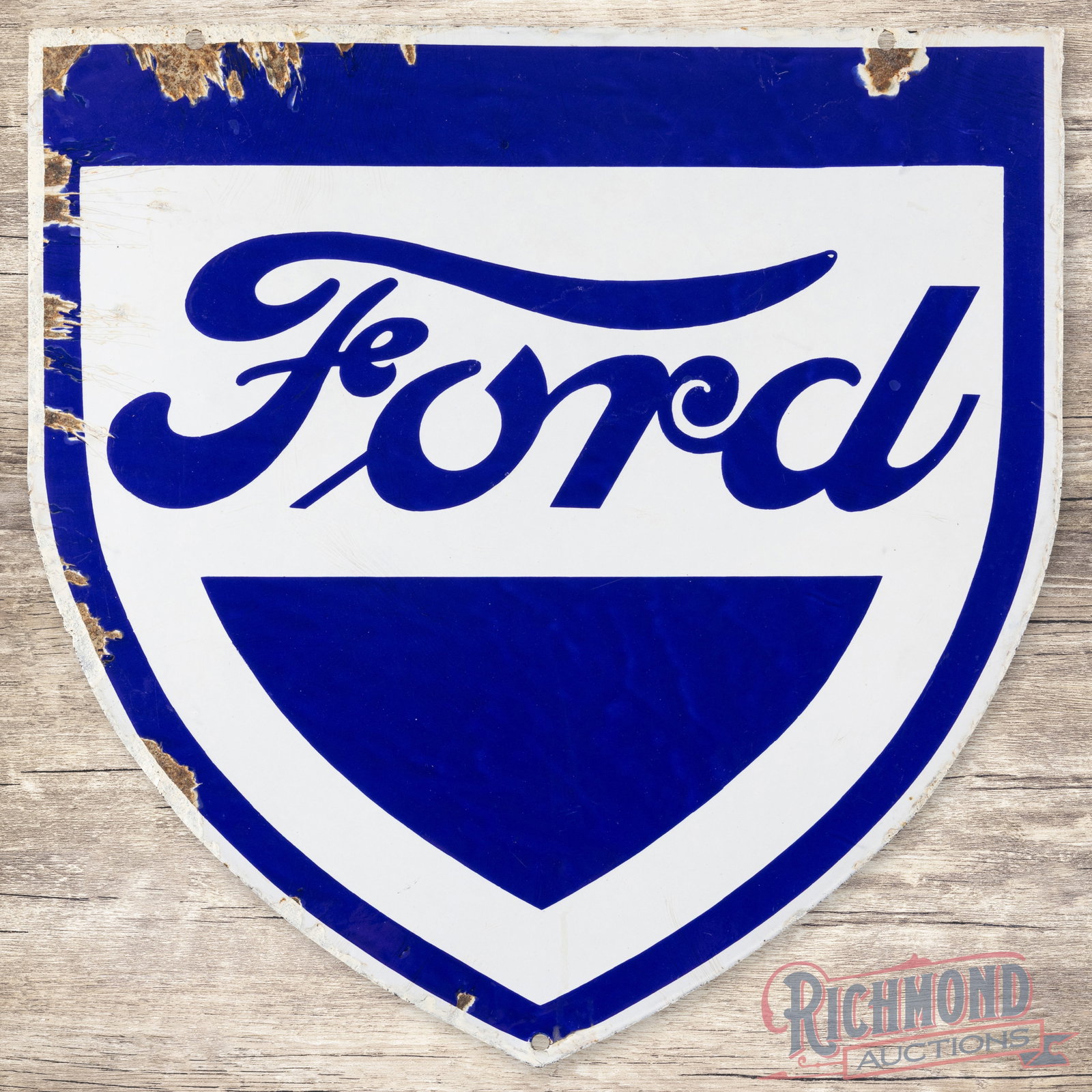 Ford Double Sided Porcelain Porcelain Shield Sign: Ford DSP (double sided porcelain) Shield Sign. Sign has great color and gloss with moderate edge wear in the perimeter. There is some color match along the white outer edge on both sides. 24" H X 23.5
